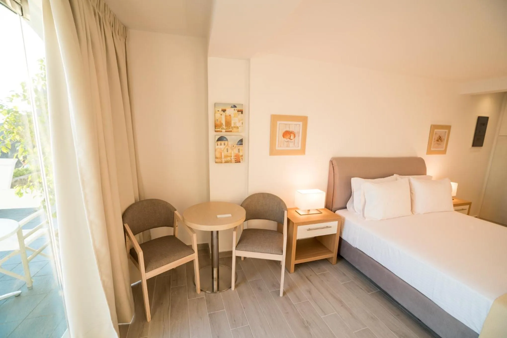 Seating area, Bed in Kratiras View Luxury Suites