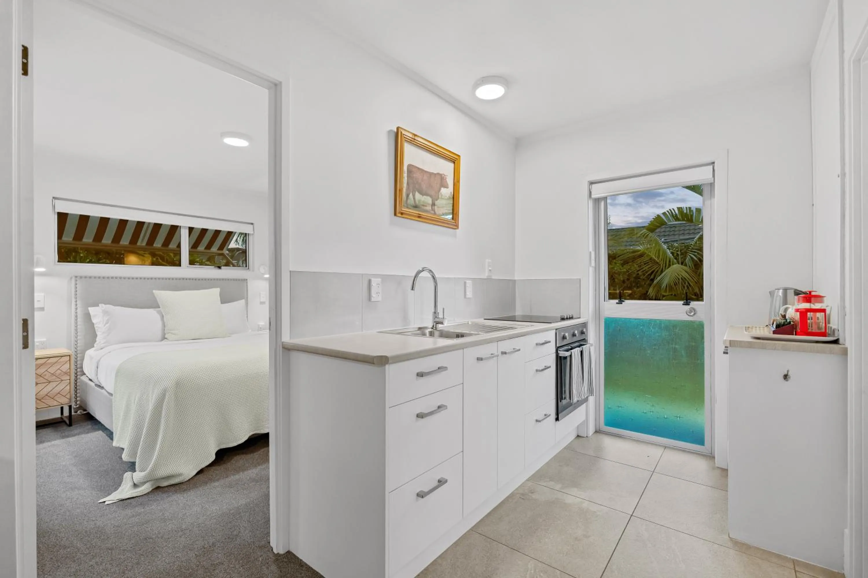 Kitchen or kitchenette, Bed in Stay Kerikeri