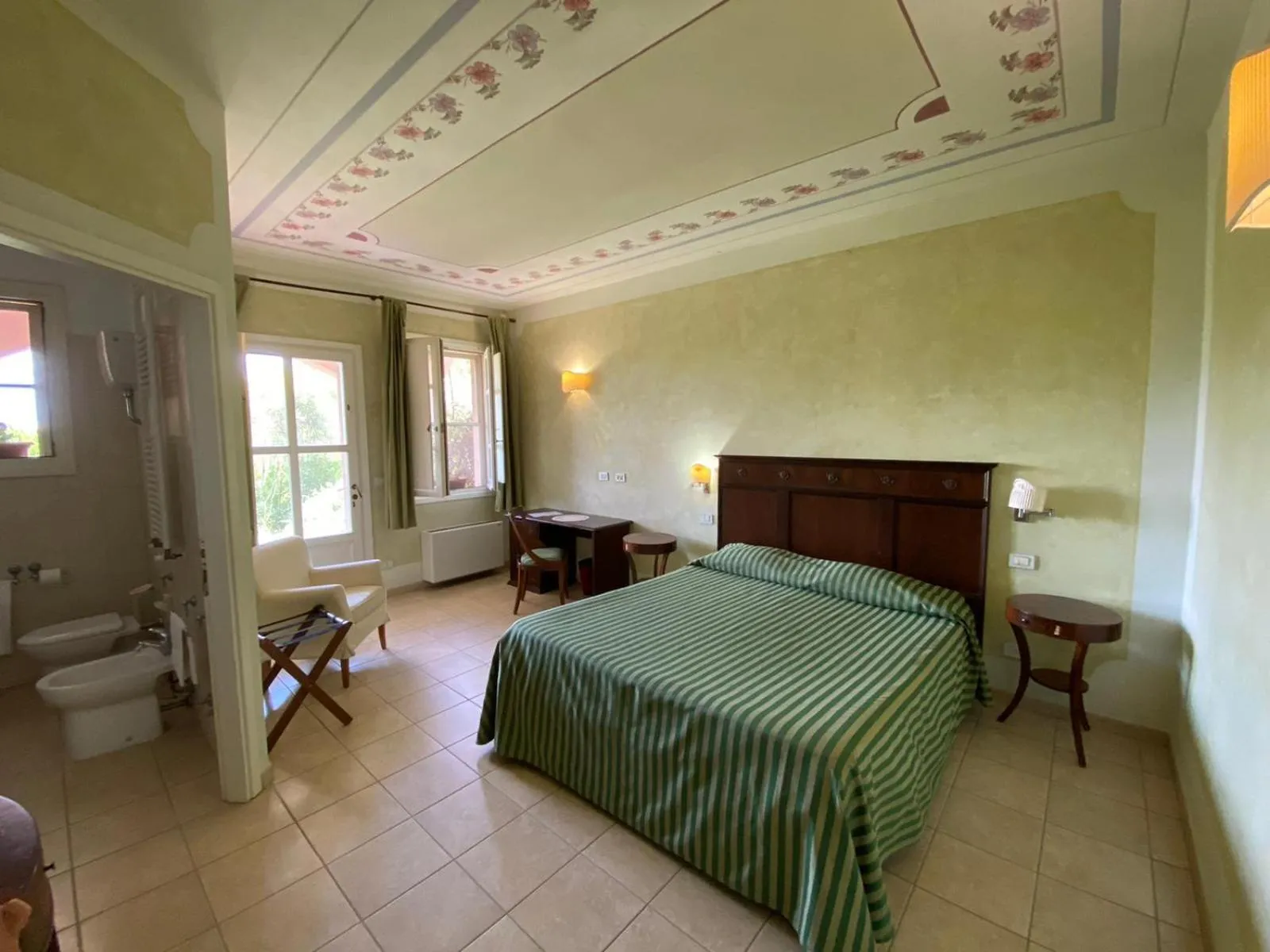 Photo of the whole room, Bed in Il Melograno Country House