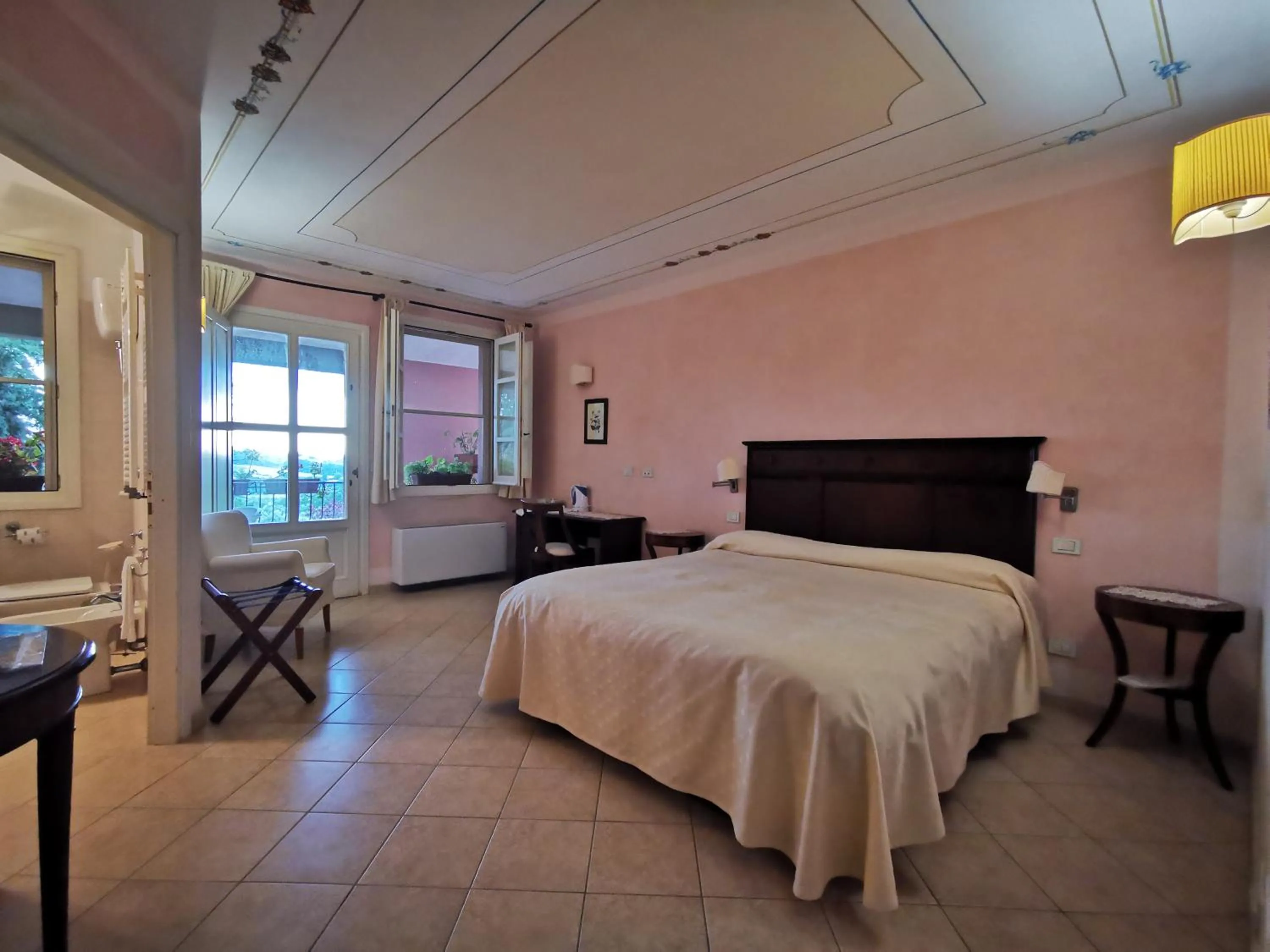 Photo of the whole room, Bed in Il Melograno Country House