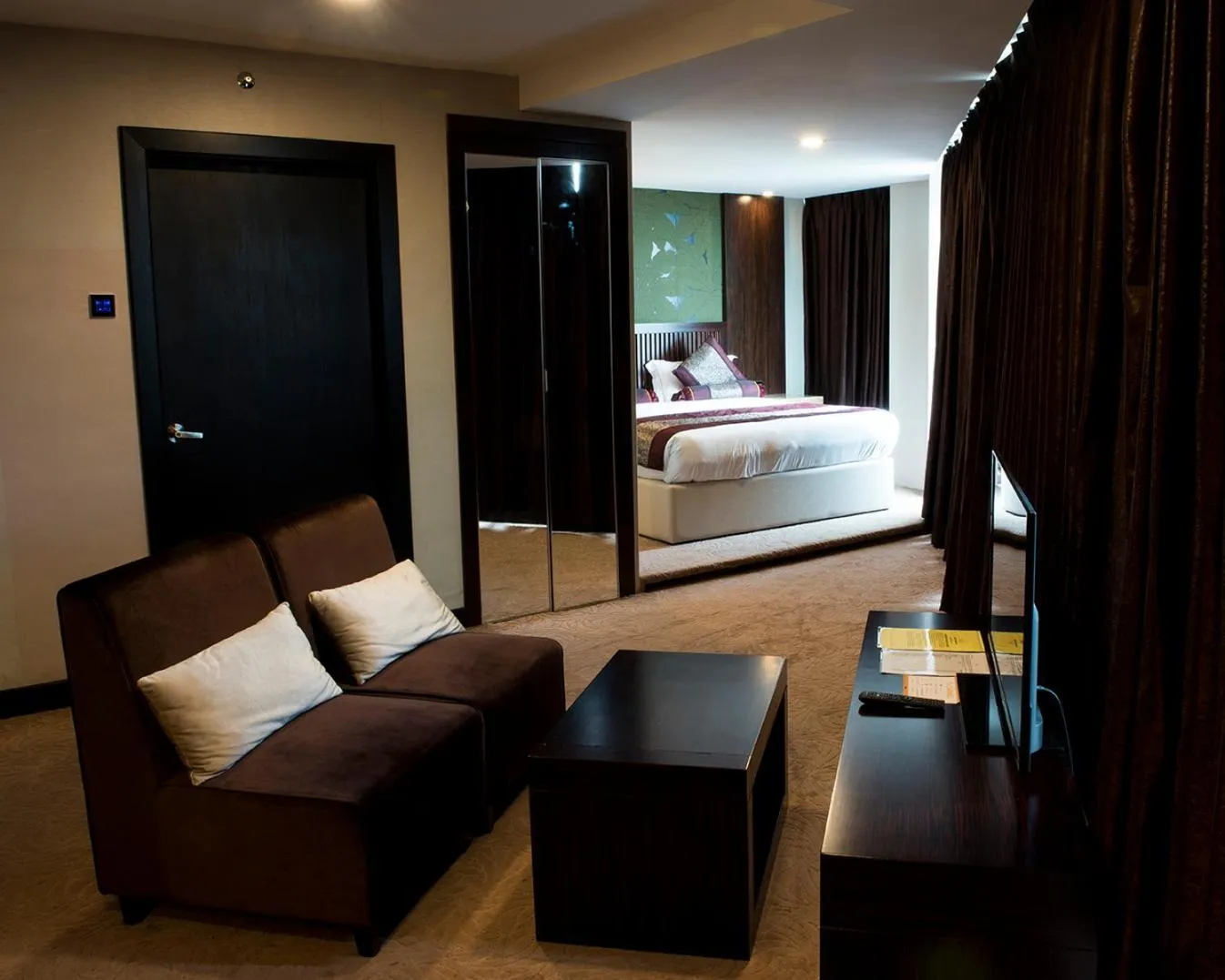 Bed in Royale Signature Hotel