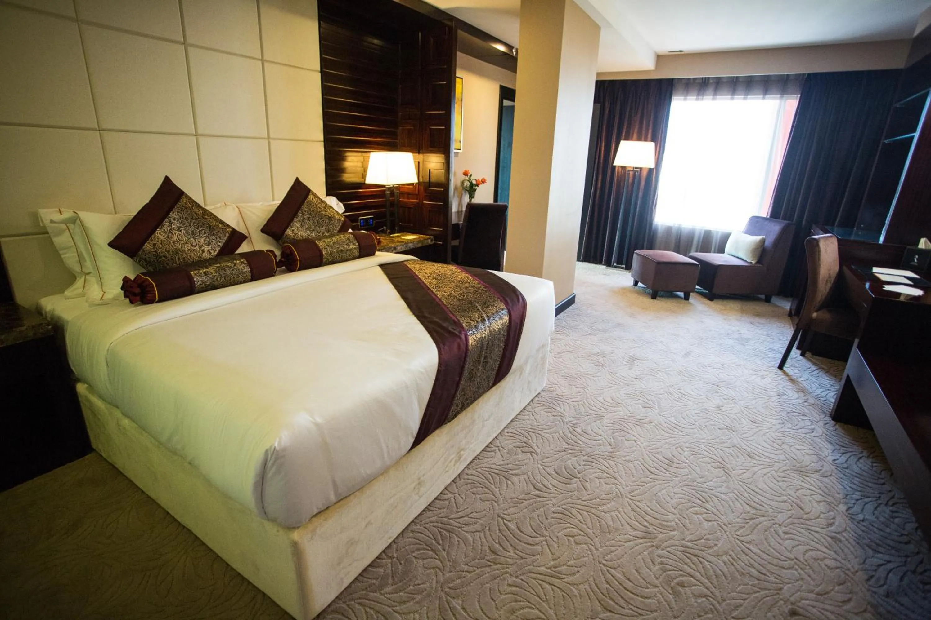 Bed in Royale Signature Hotel
