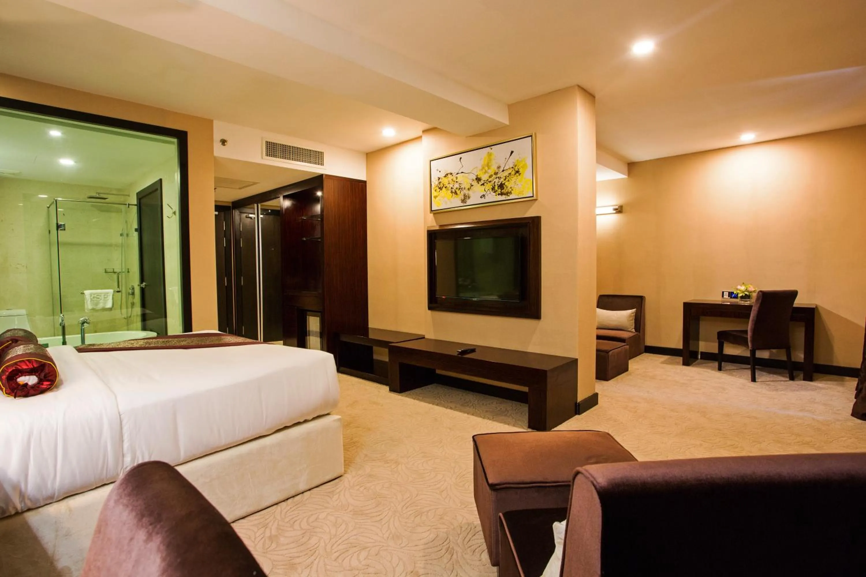 Bed in Royale Signature Hotel