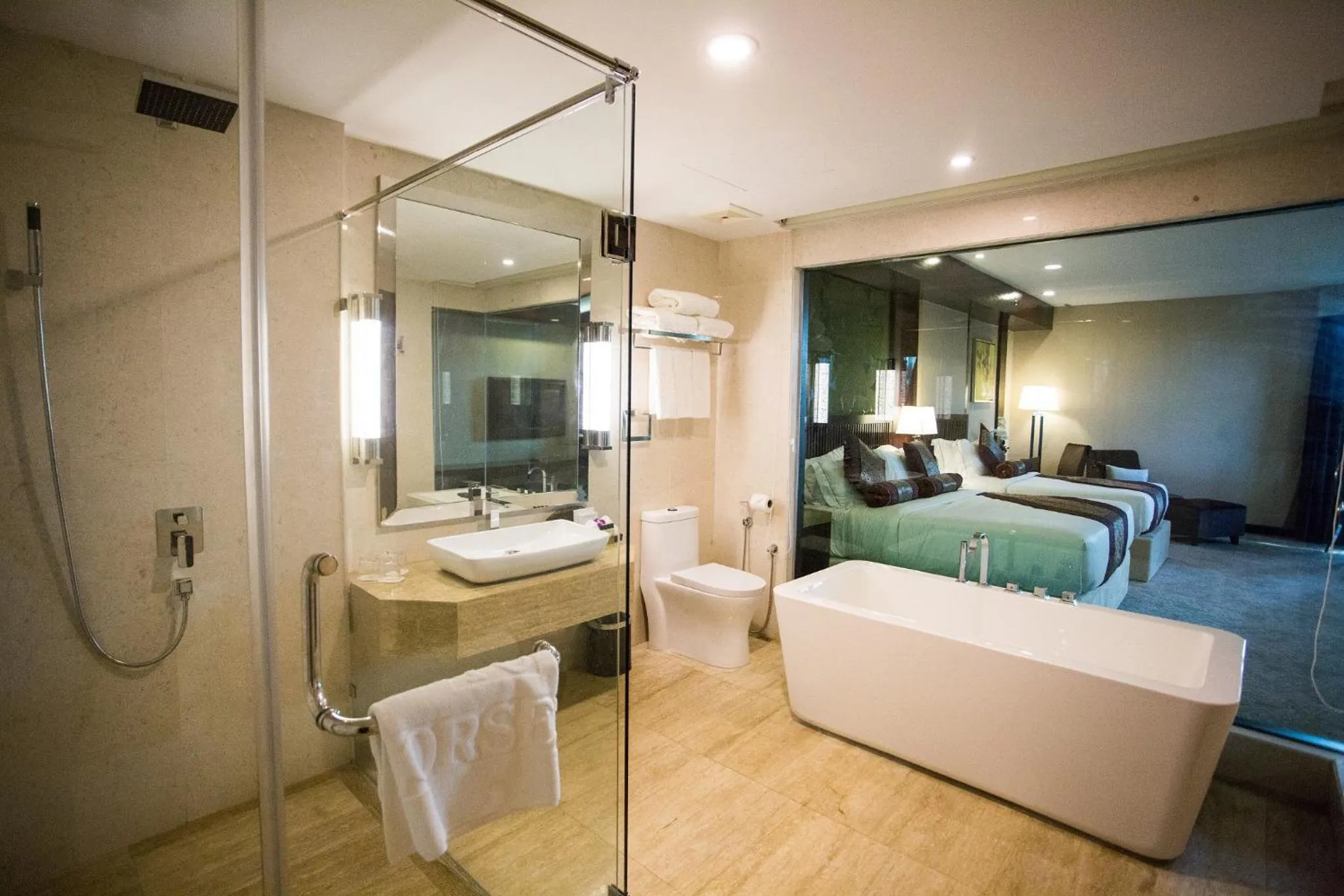 Bed in Royale Signature Hotel