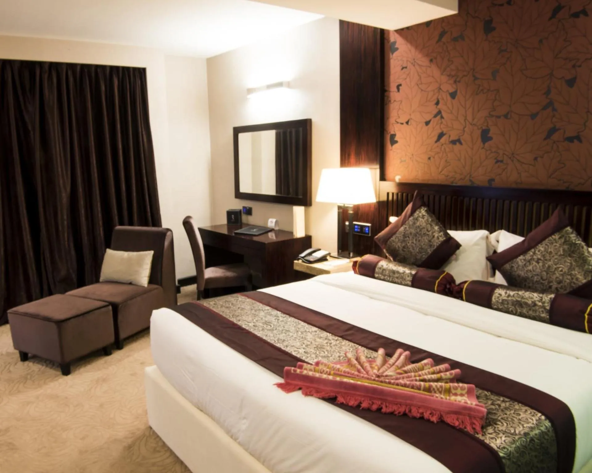 Bed in Royale Signature Hotel