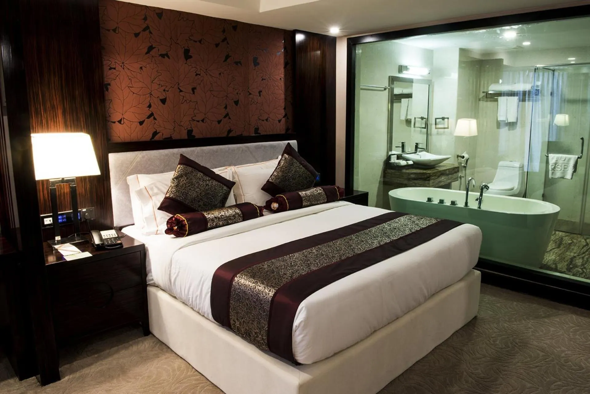 Bed in Royale Signature Hotel