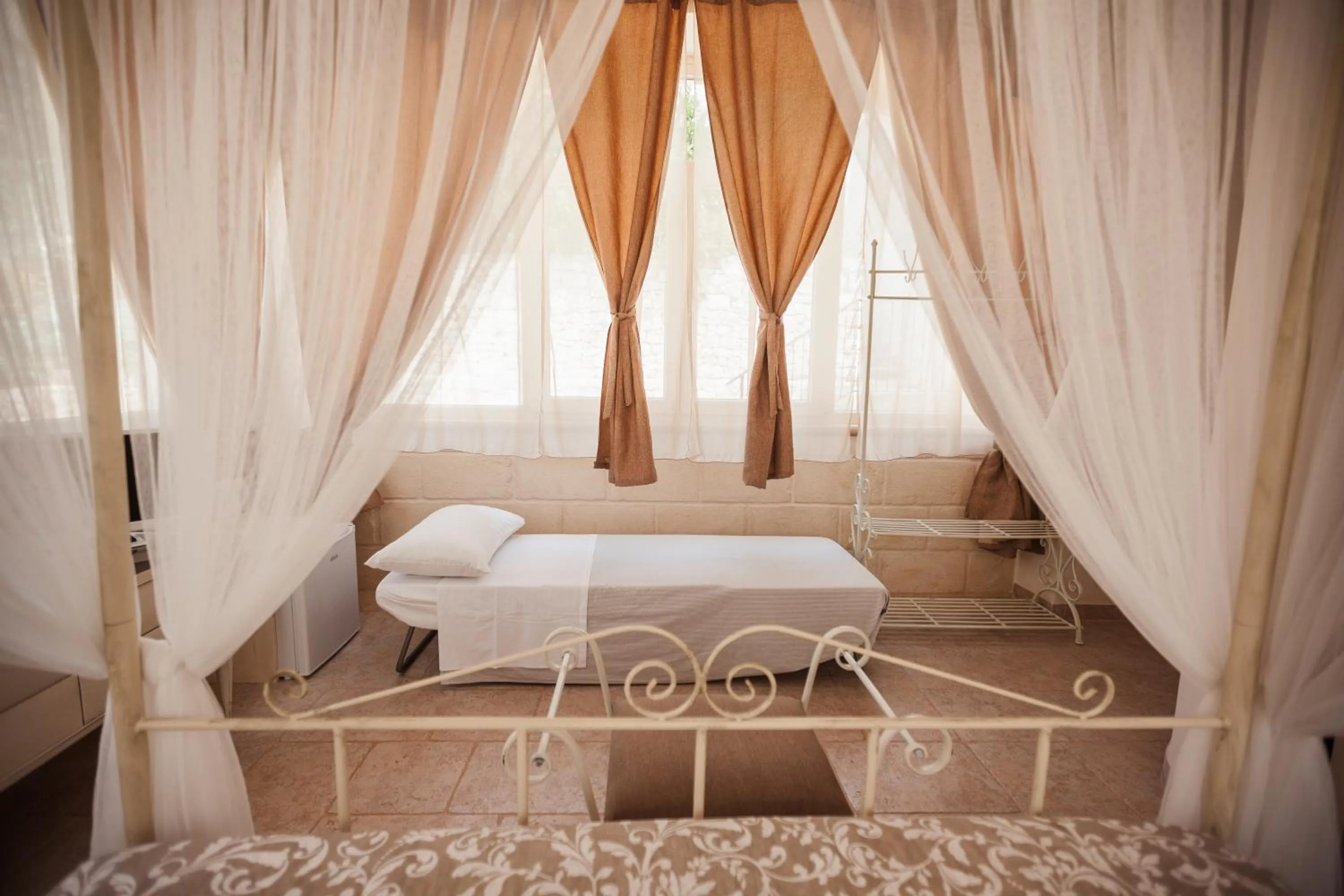 Bed in I Trulli del Tupparello