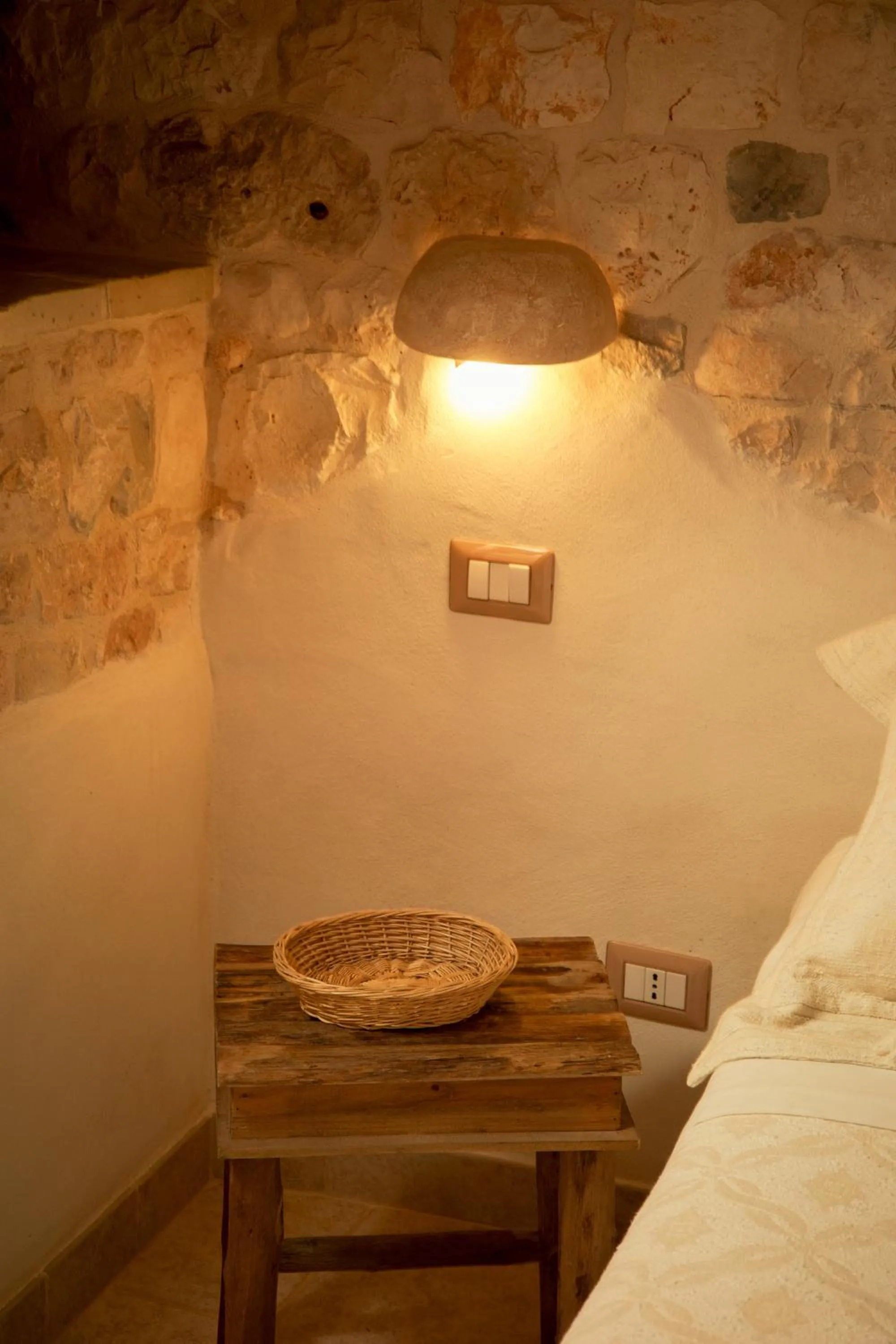 Bed in I Trulli del Tupparello