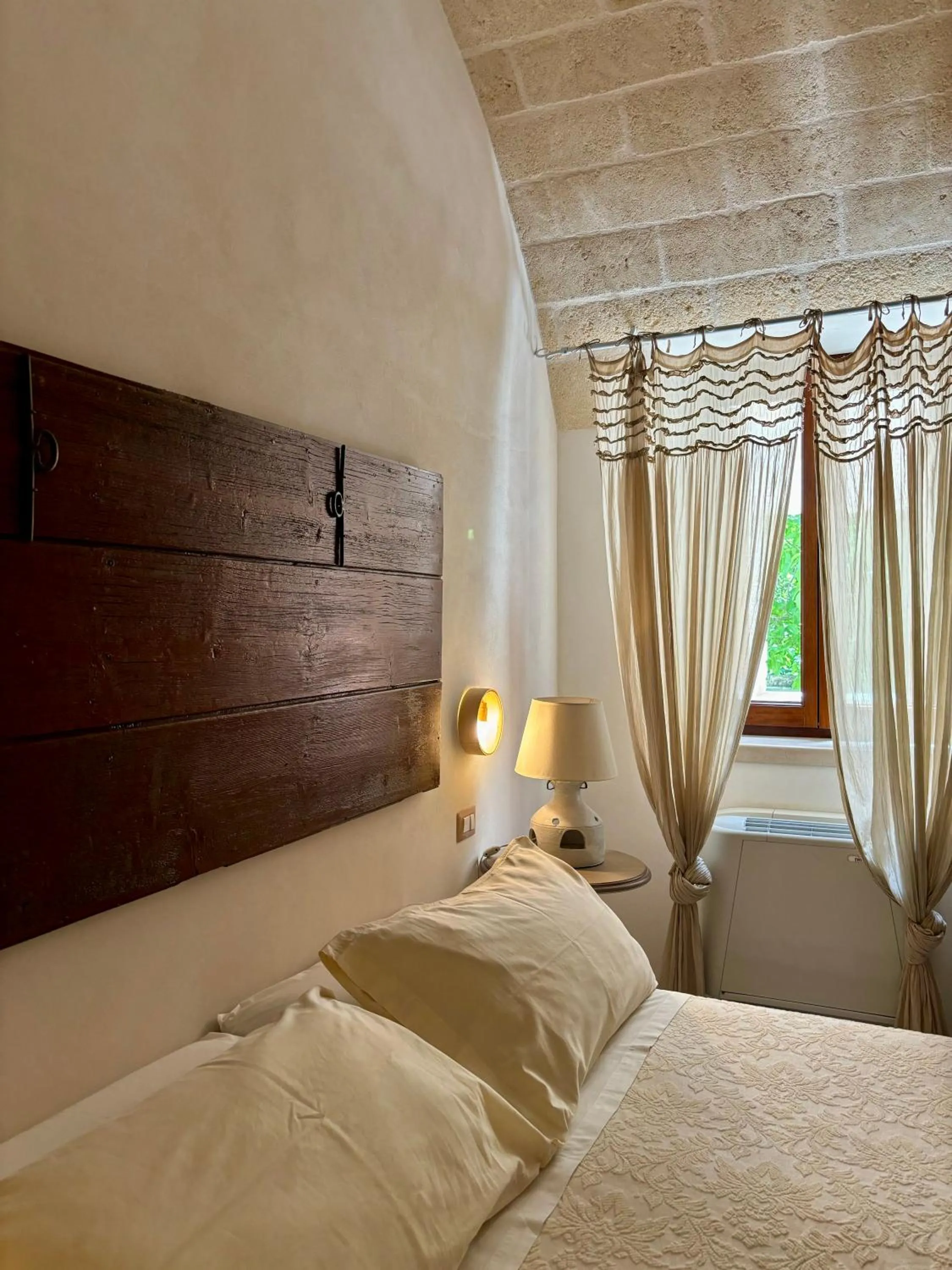 Bed in I Trulli del Tupparello