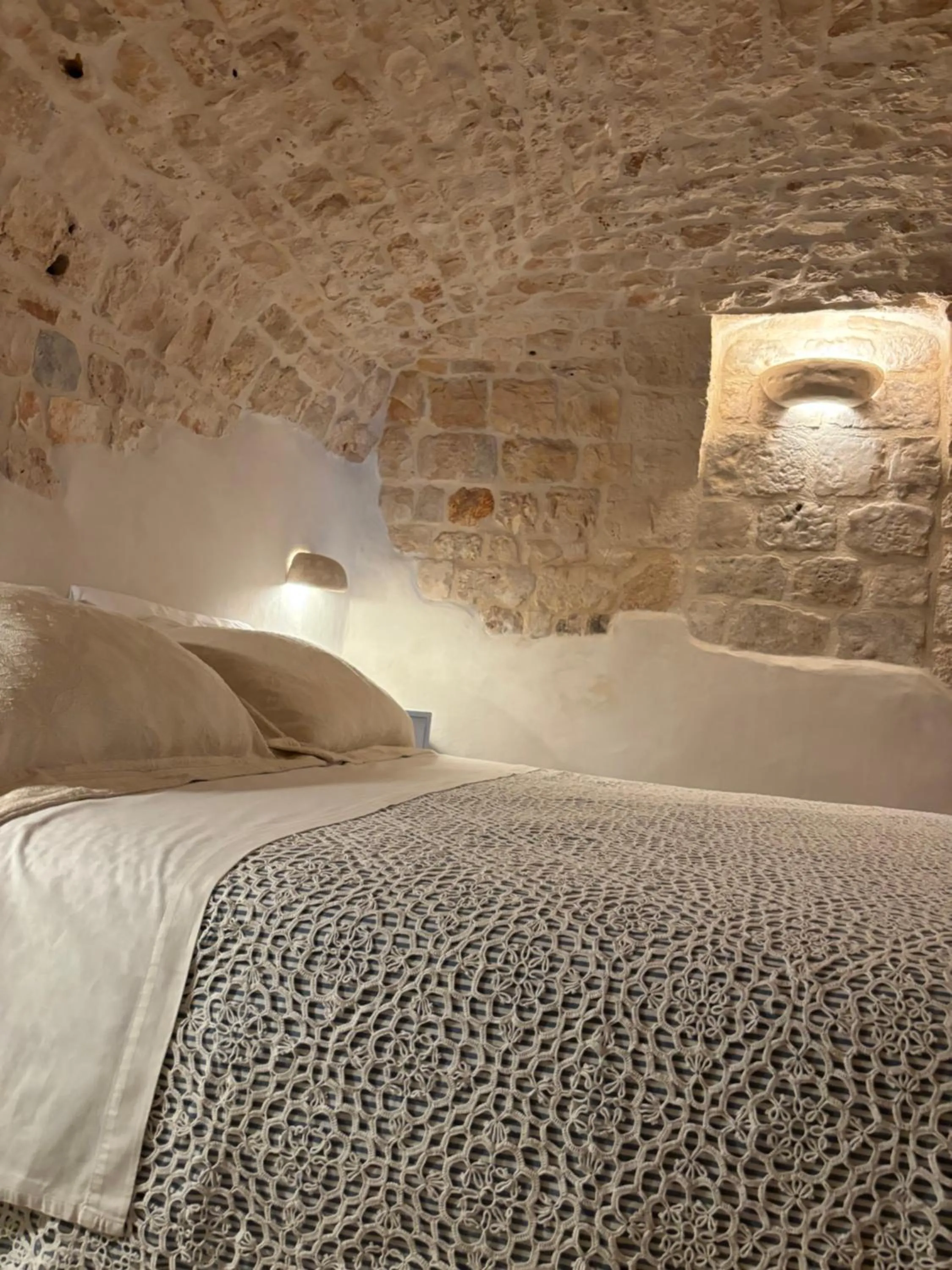 Bed in I Trulli del Tupparello