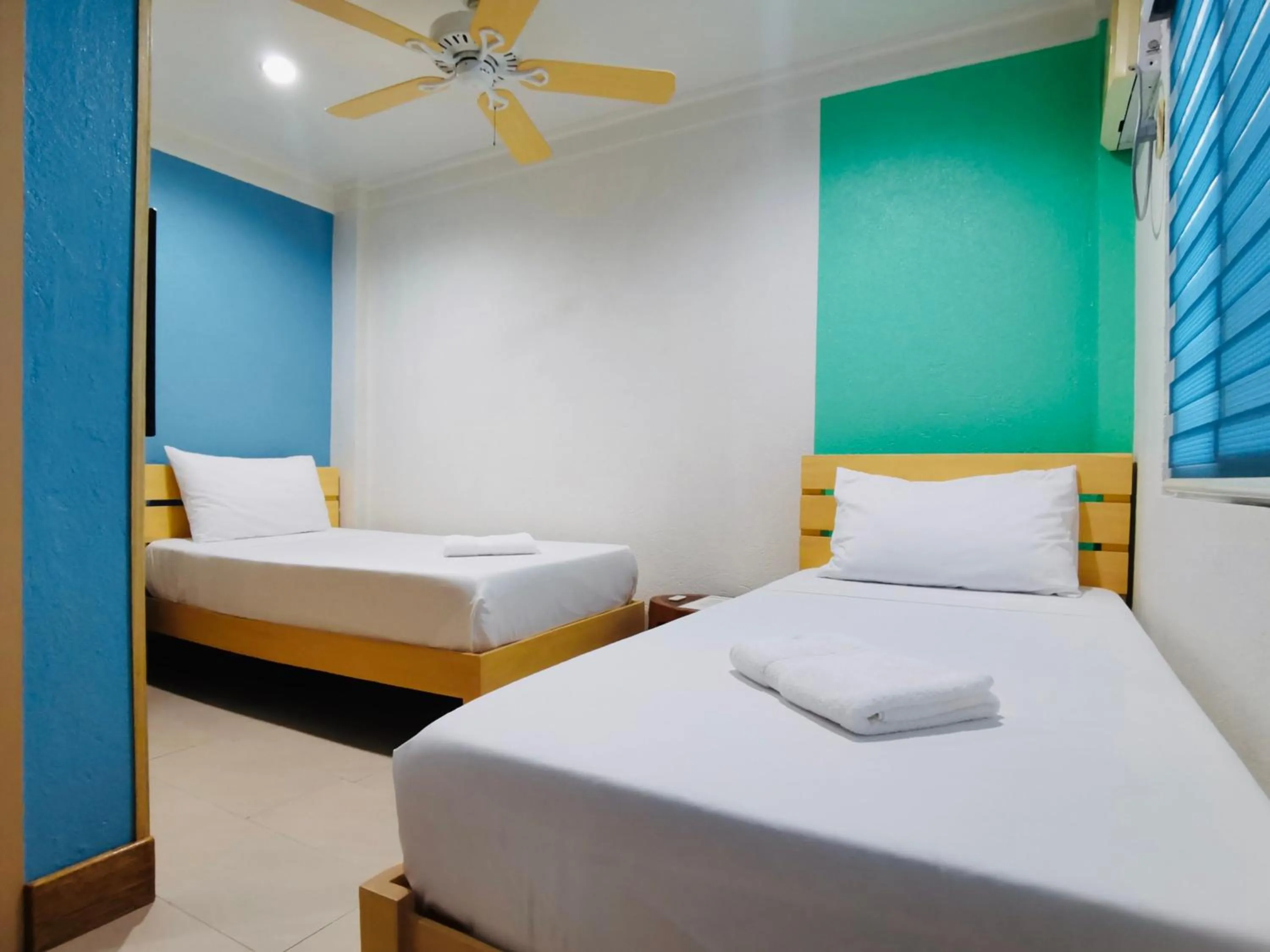 Bed in Den Den Guesthouse