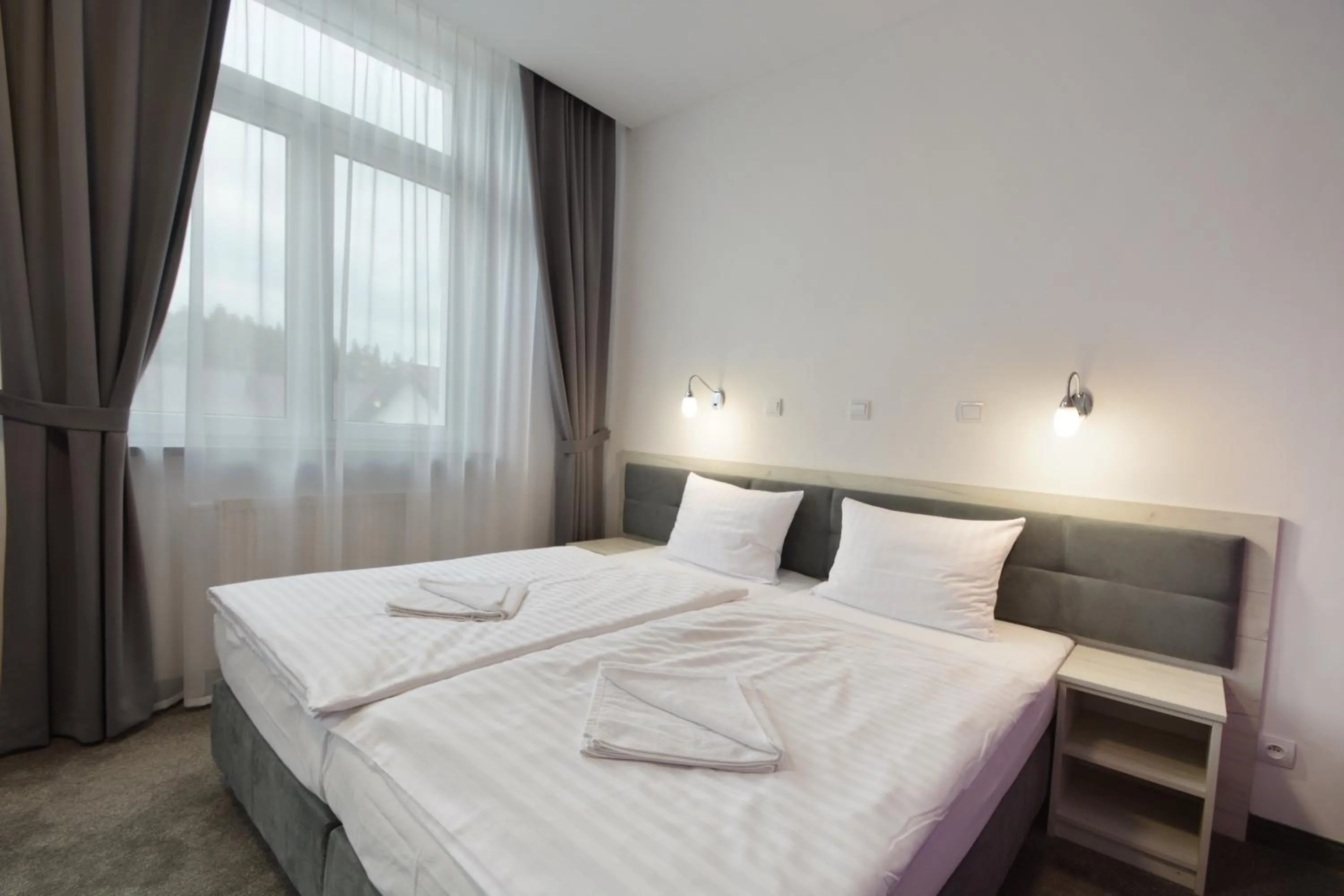 Bed in Hotel Roztocze