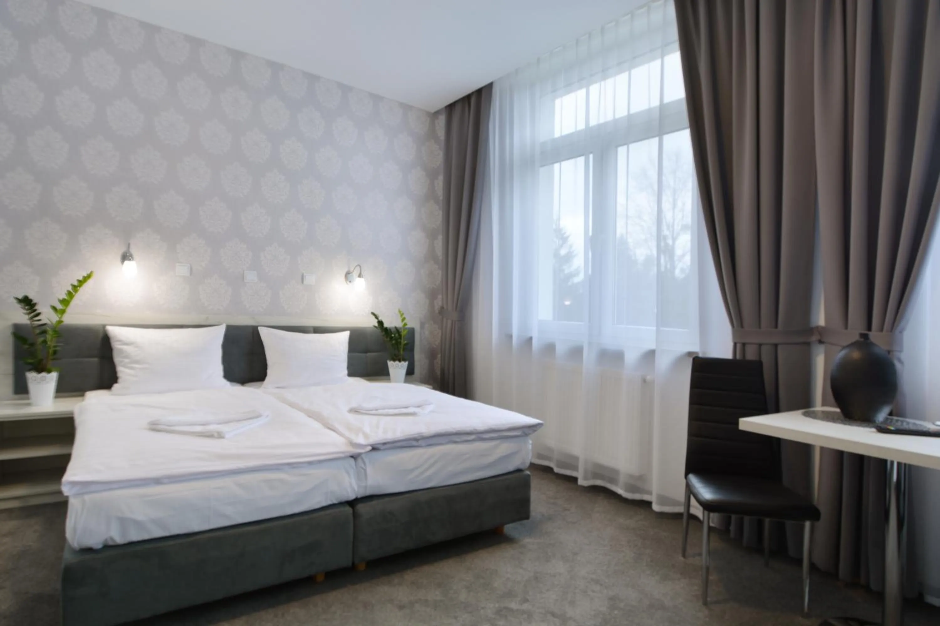 Bed in Hotel Roztocze