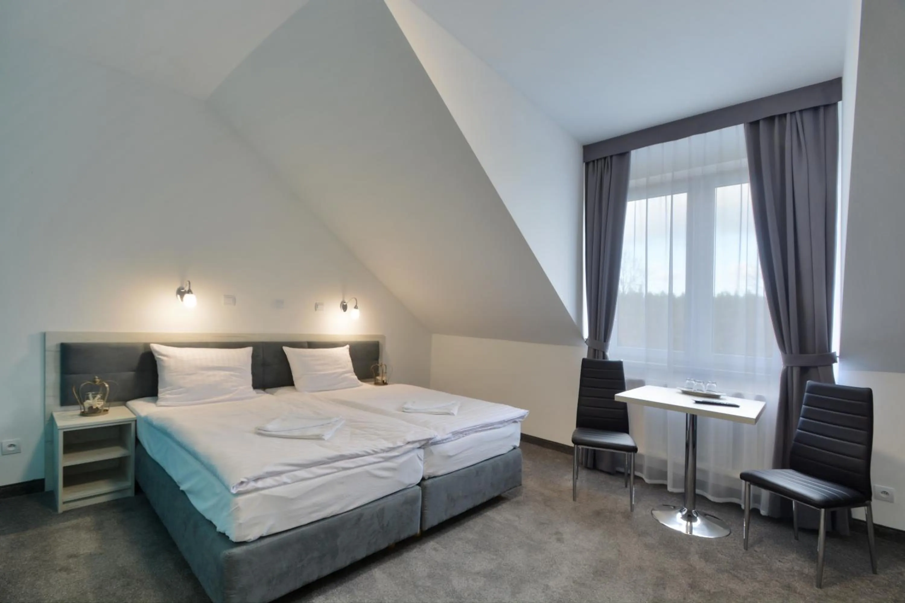 Bed in Hotel Roztocze