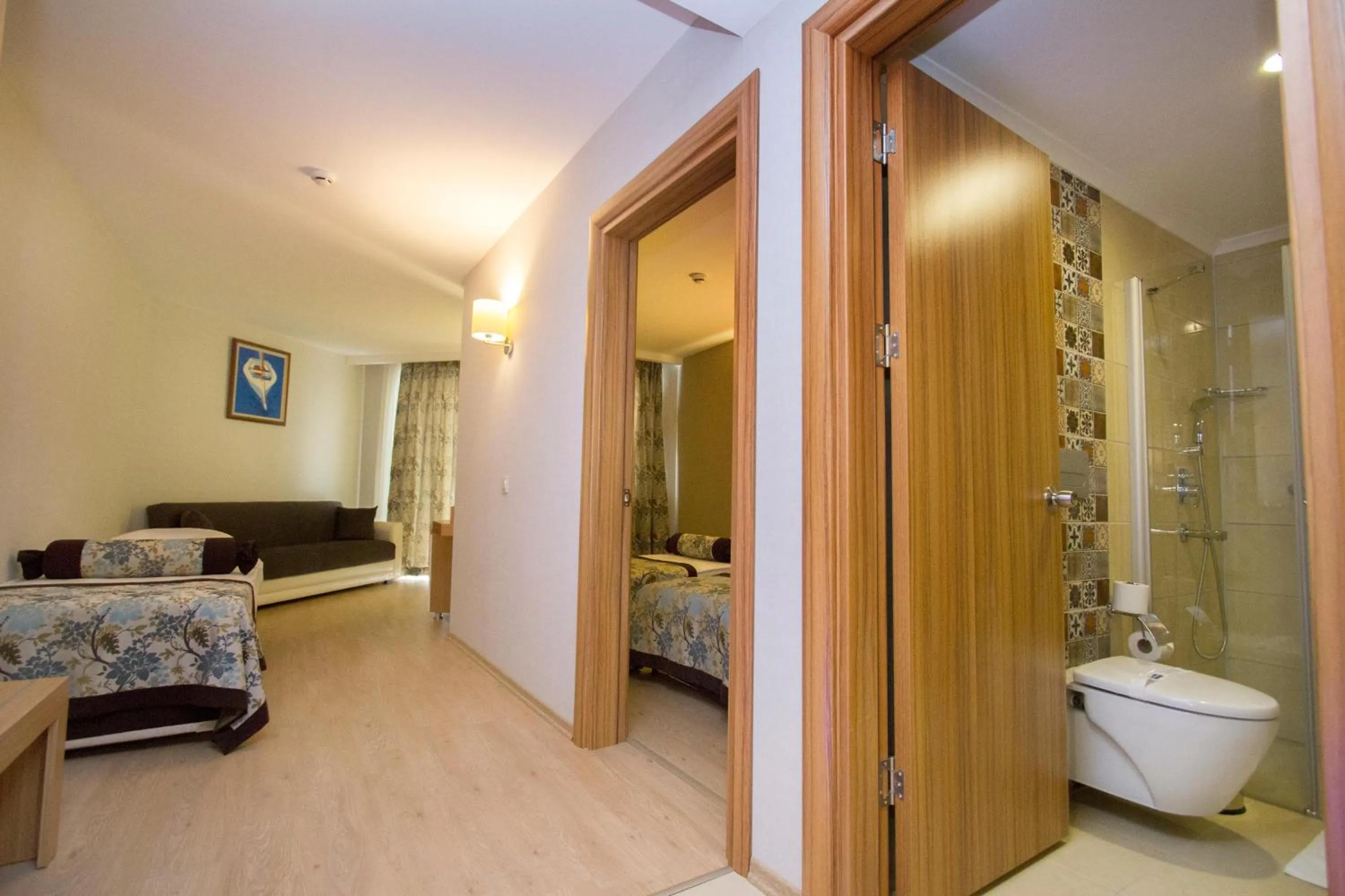 Photo of the whole room in Blue Wave Suite Hotel