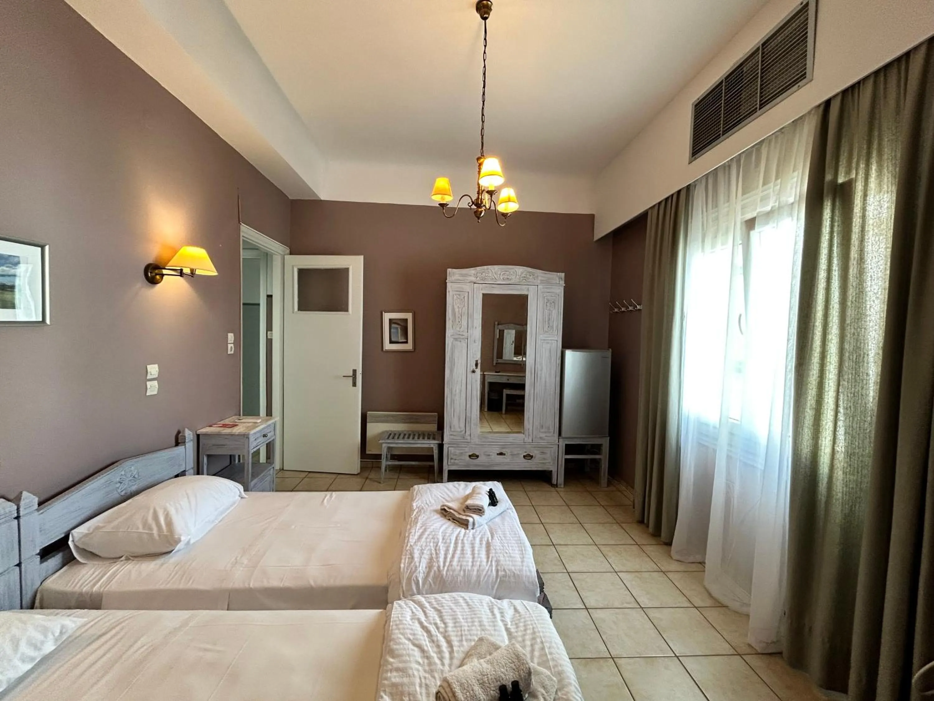 Bed in Tinion Urban Hotel