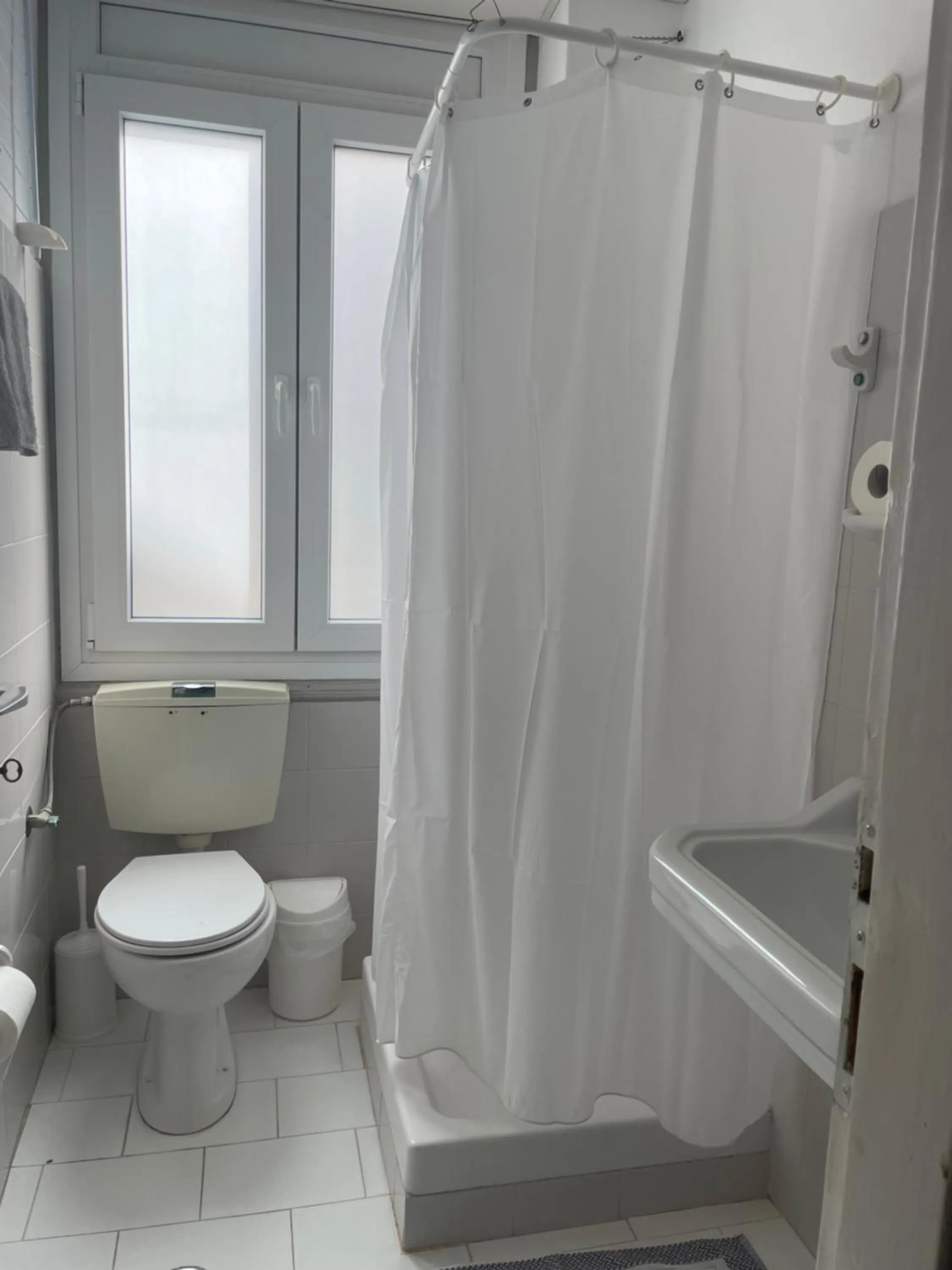 Toilet in Tinion Urban Hotel