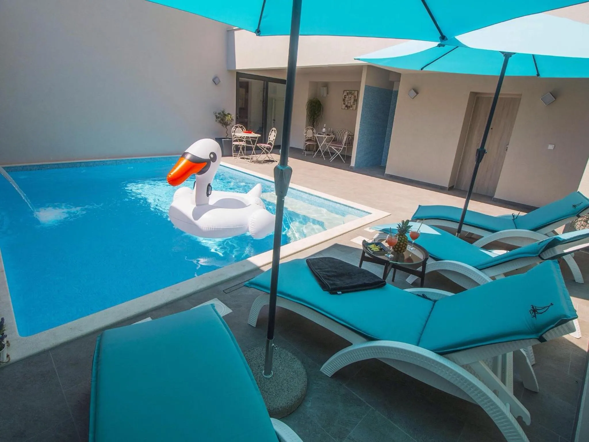 Swimming pool in Luxury Rooms Pino