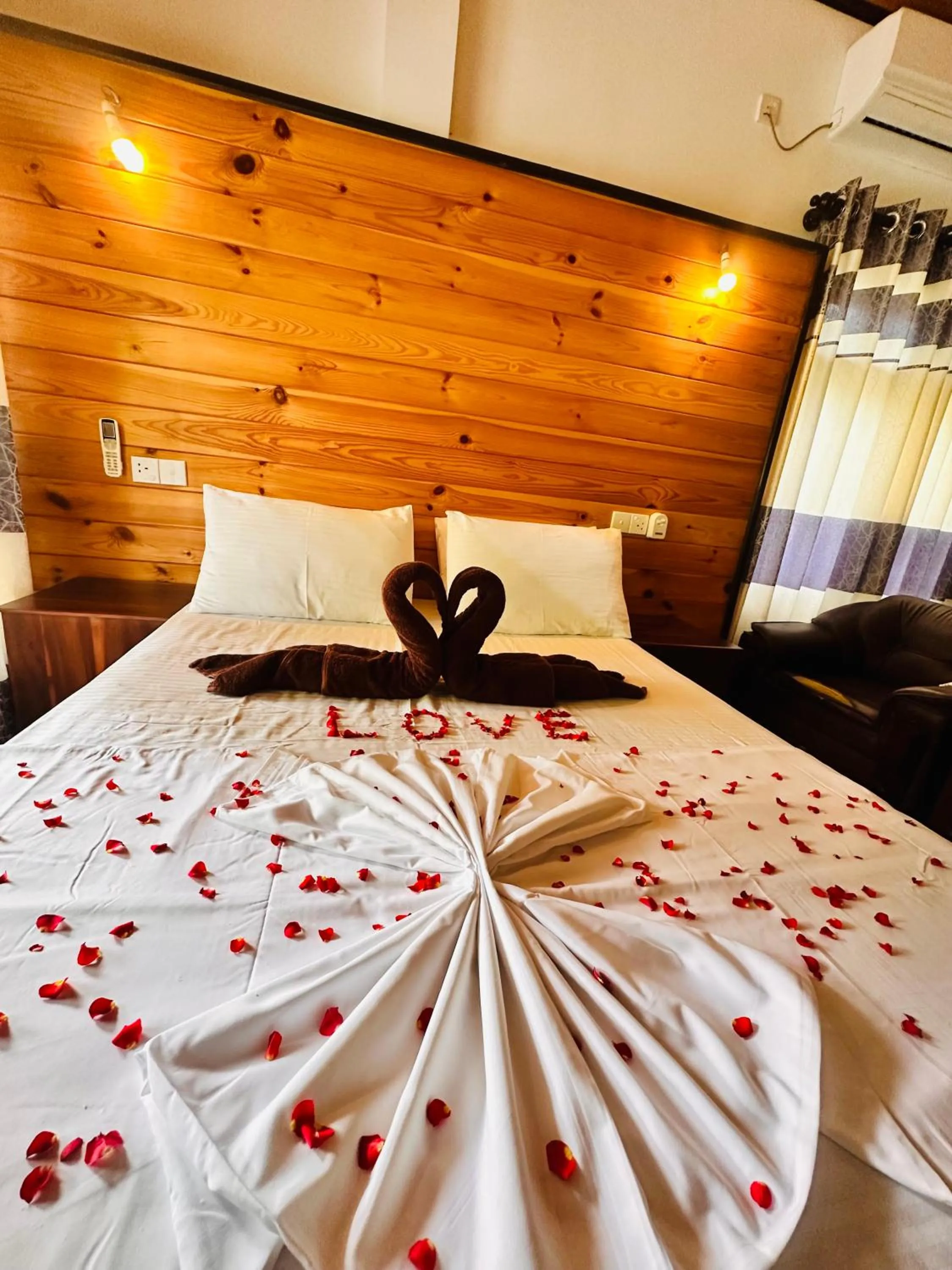 Bed in Rekawa Turtle Gate Hotel