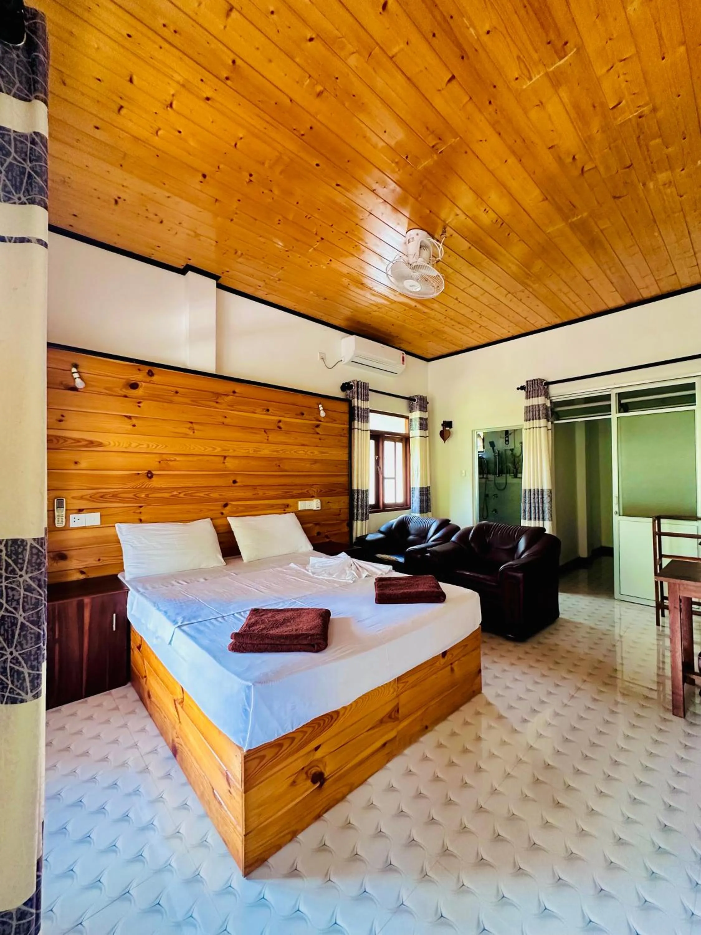 Bed in Rekawa Turtle Gate Hotel