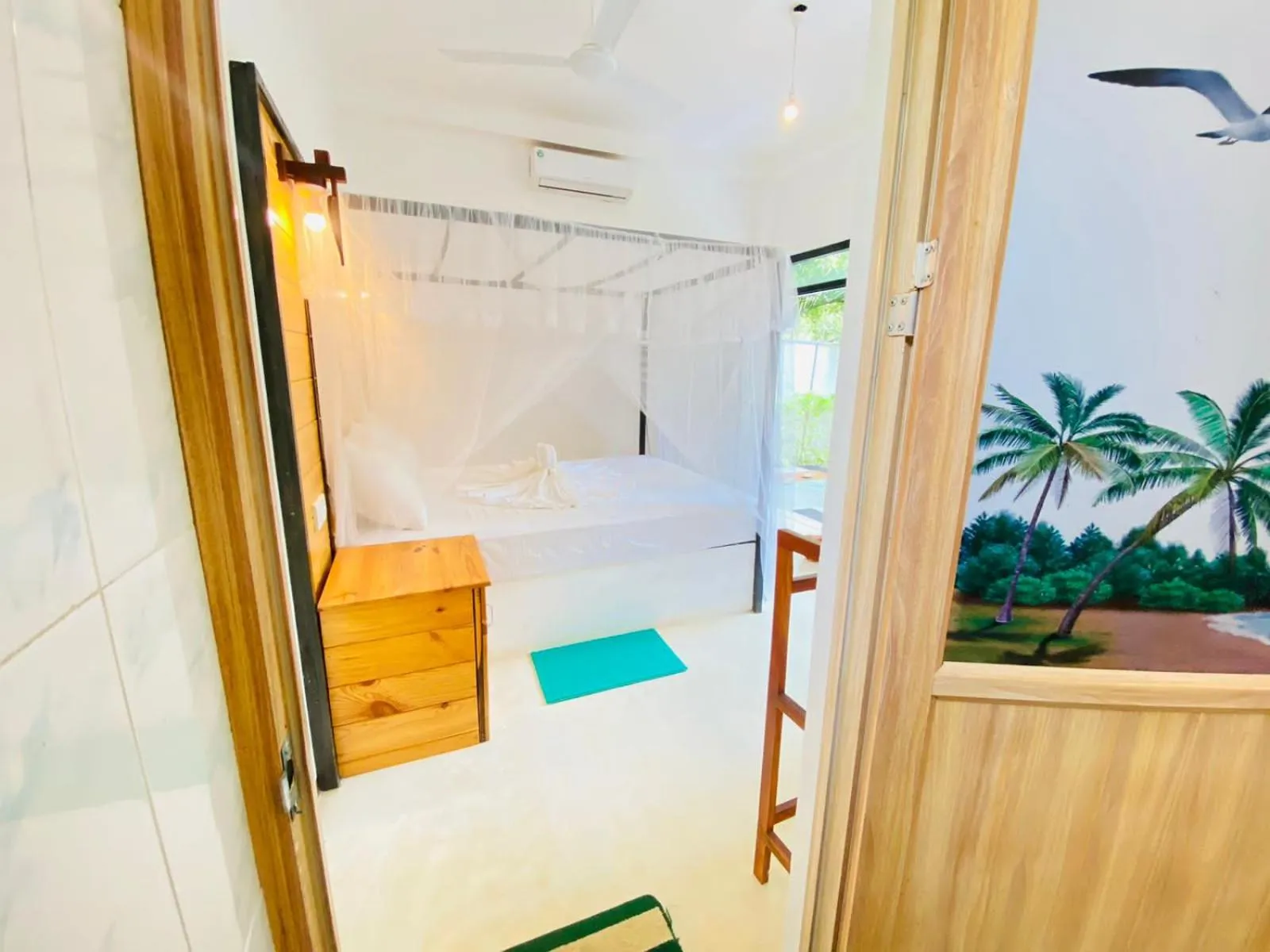 Bed in Rekawa Turtle Gate Hotel