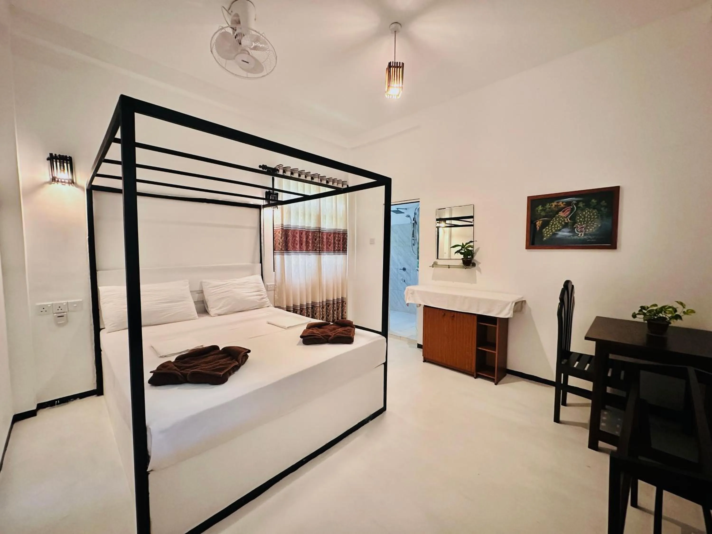 Bed in Rekawa Turtle Gate Hotel