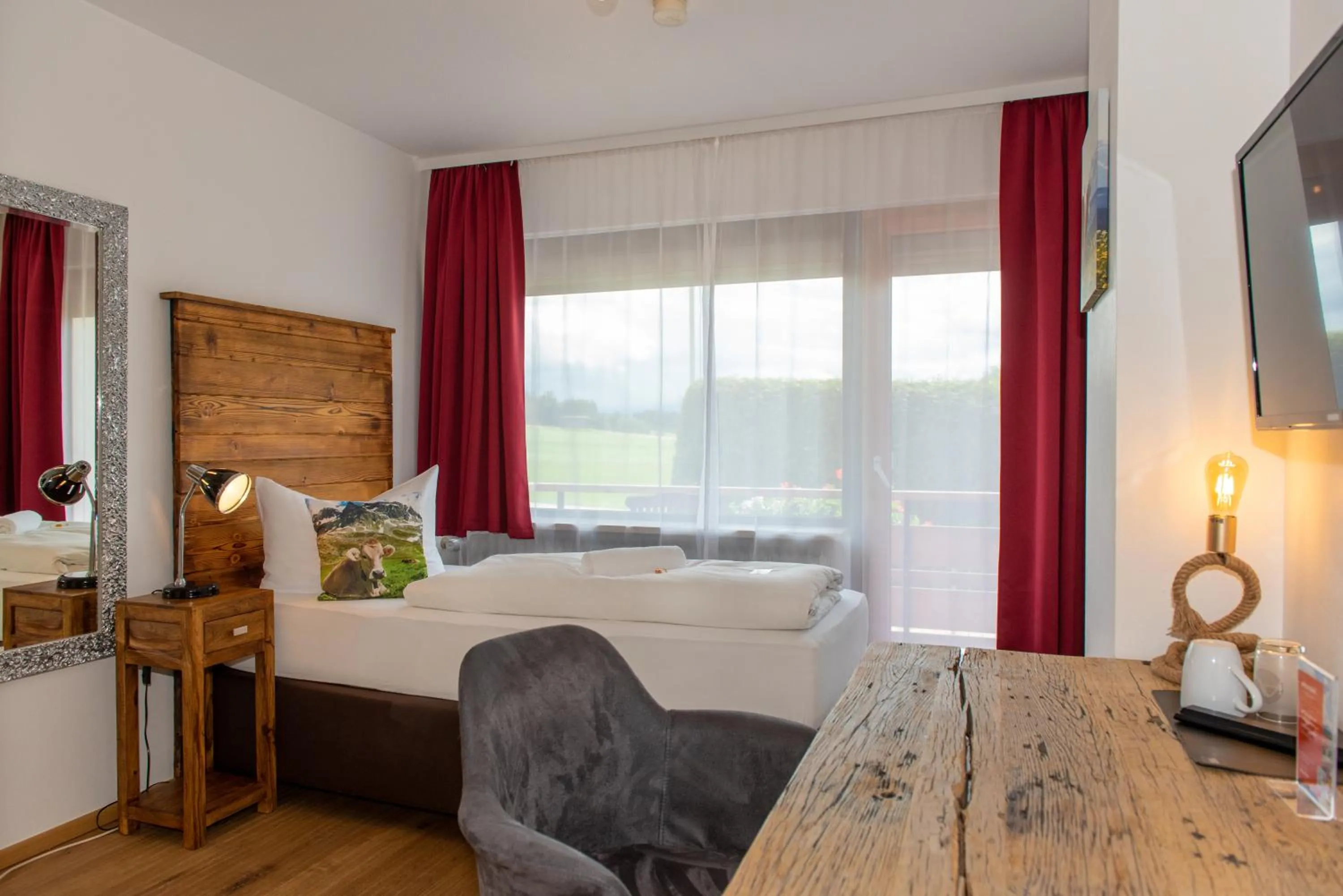 Photo of the whole room, Bed in Hotel Alpenglühn