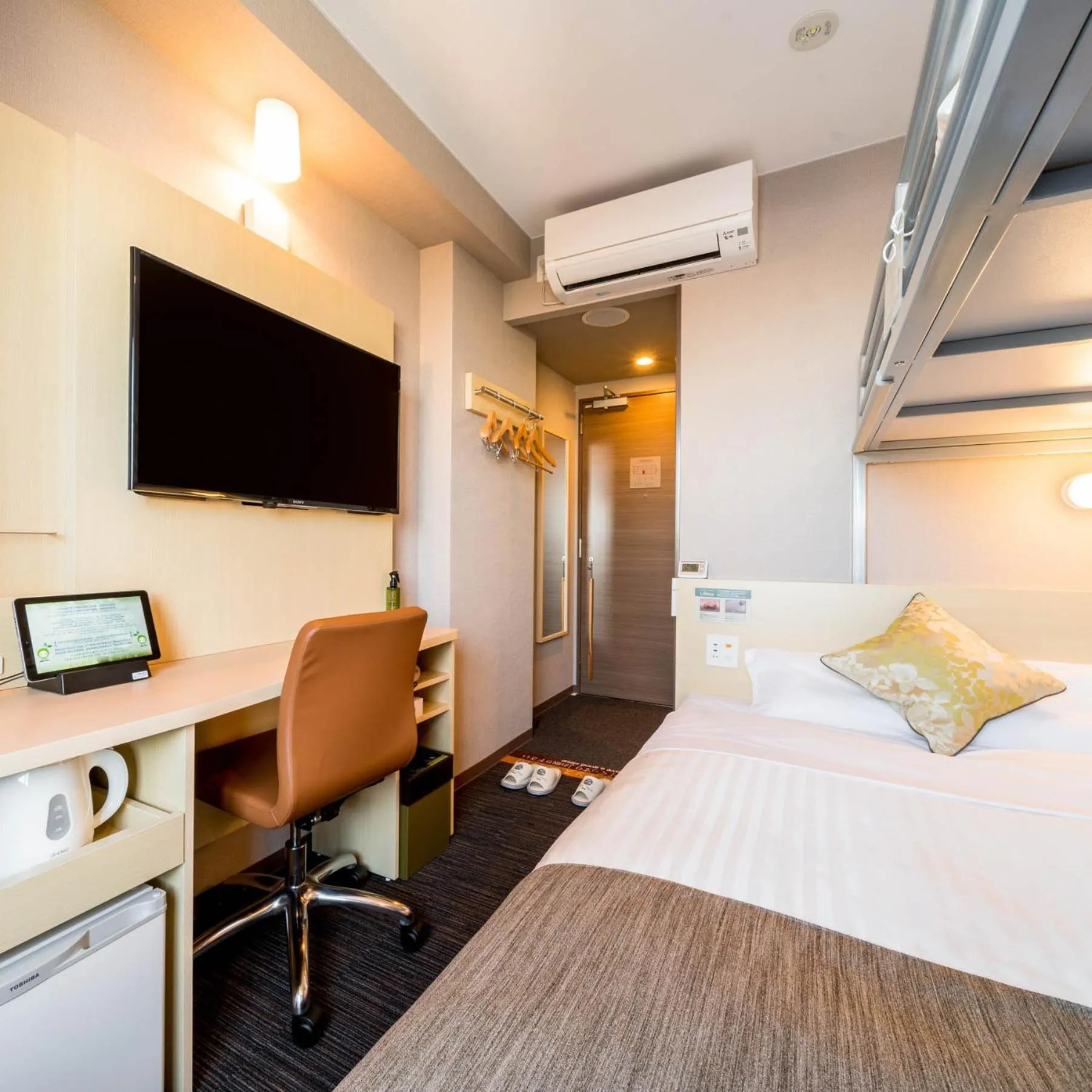 Bed in Super Hotel Premier Musashi Kosugi Ekimae