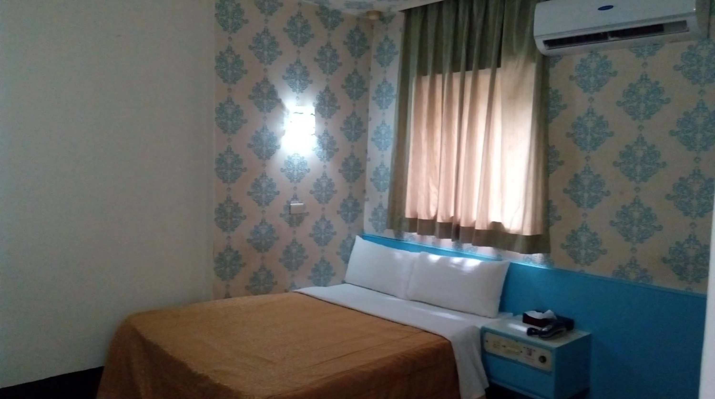 Bed in Reui Chung Hotel