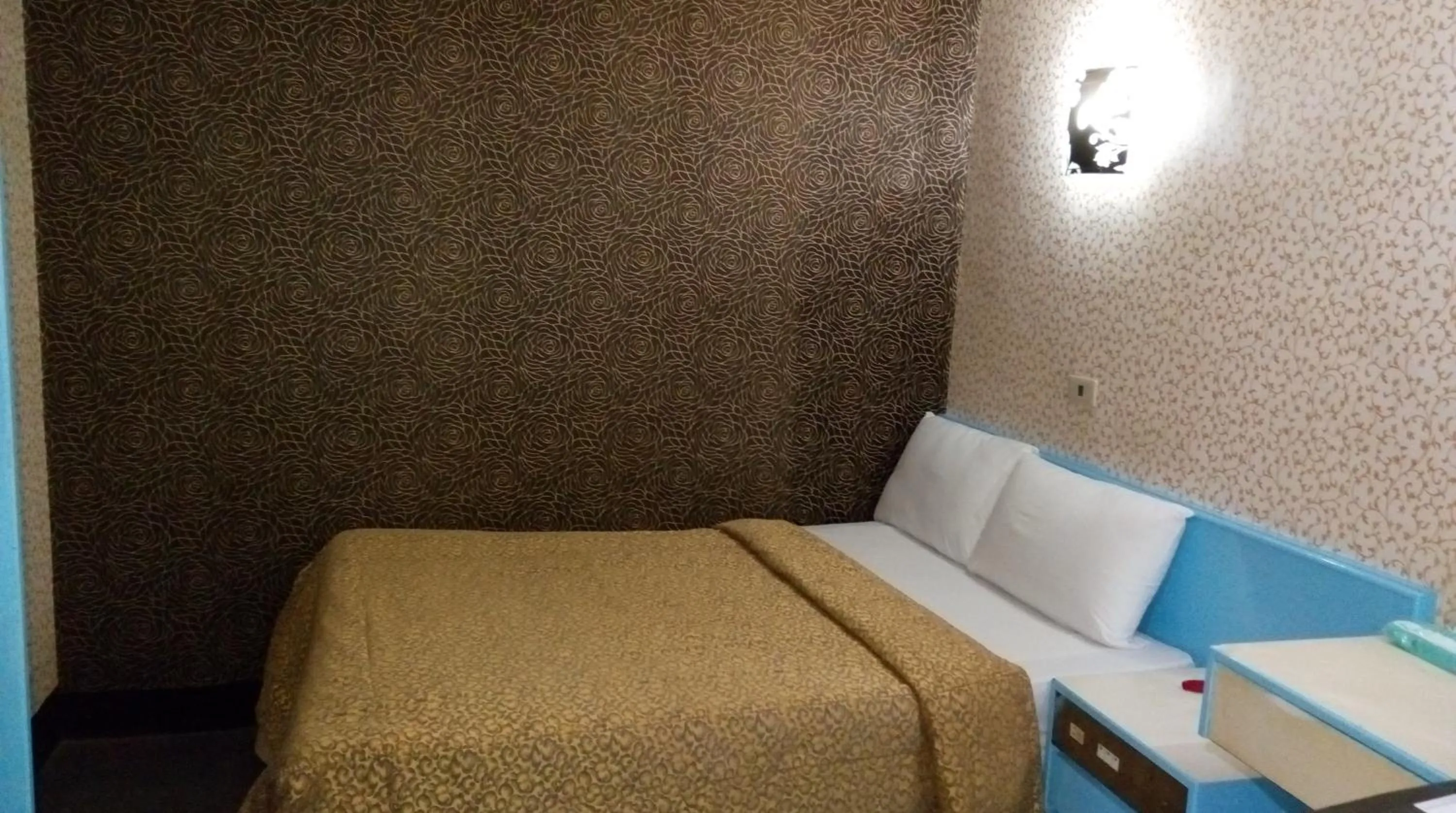 Bed in Reui Chung Hotel