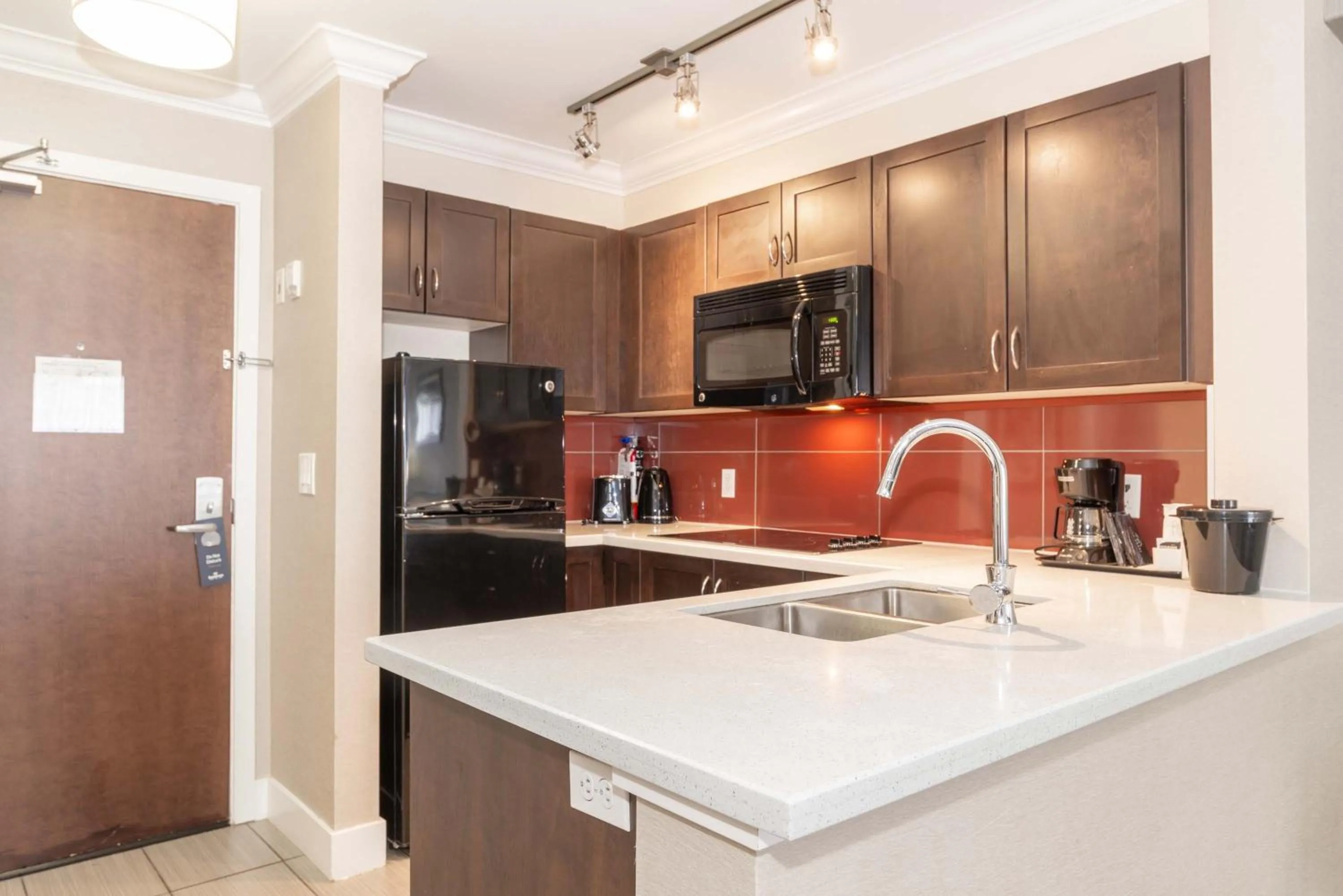 Kitchen or kitchenette in Sandman Hotel and Suites Abbotsford