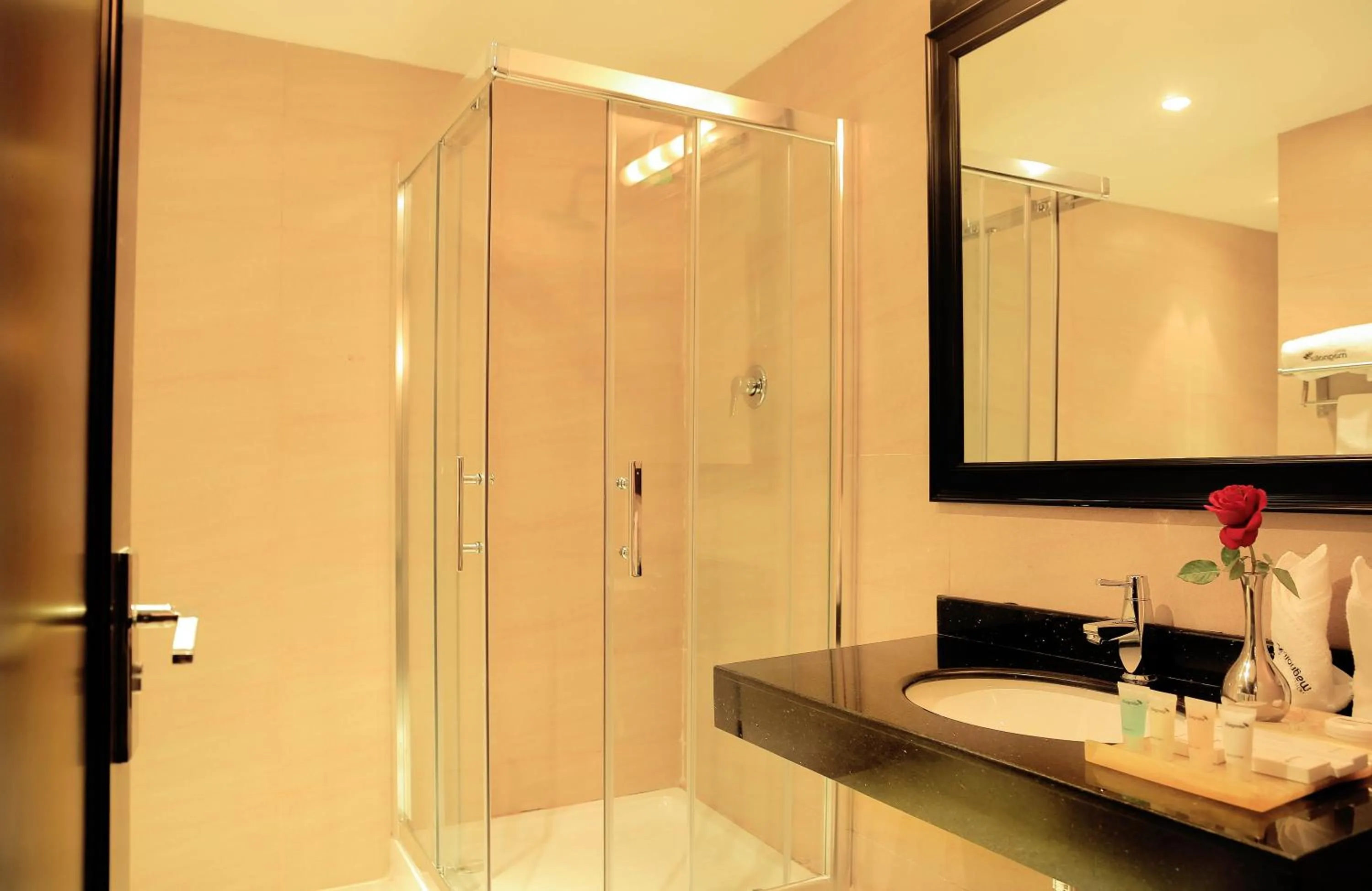 Bathroom in Magnolia Hotel & Conference Center