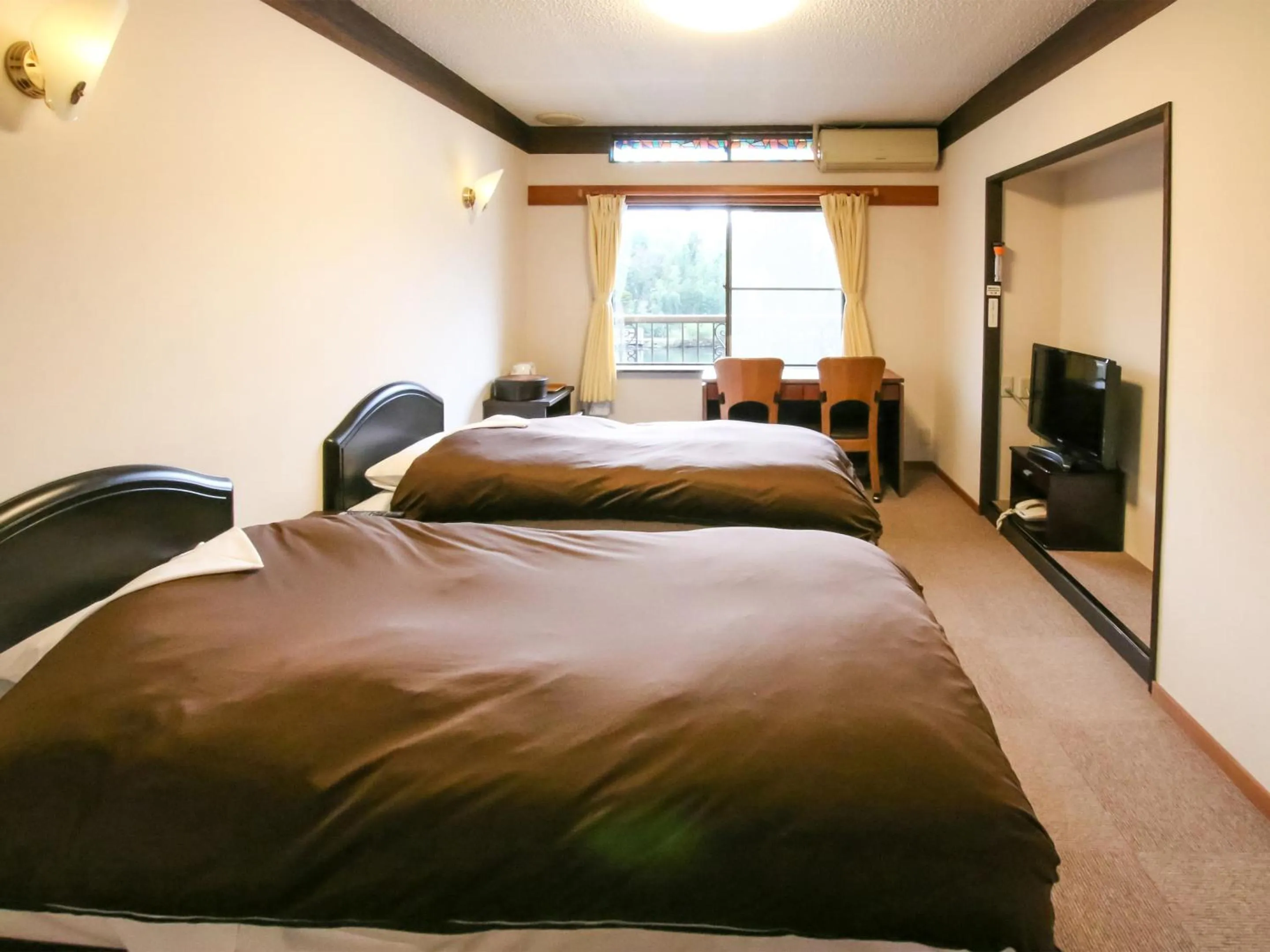 Photo of the whole room, Bed in Pension Kinrinko Toyonokuni