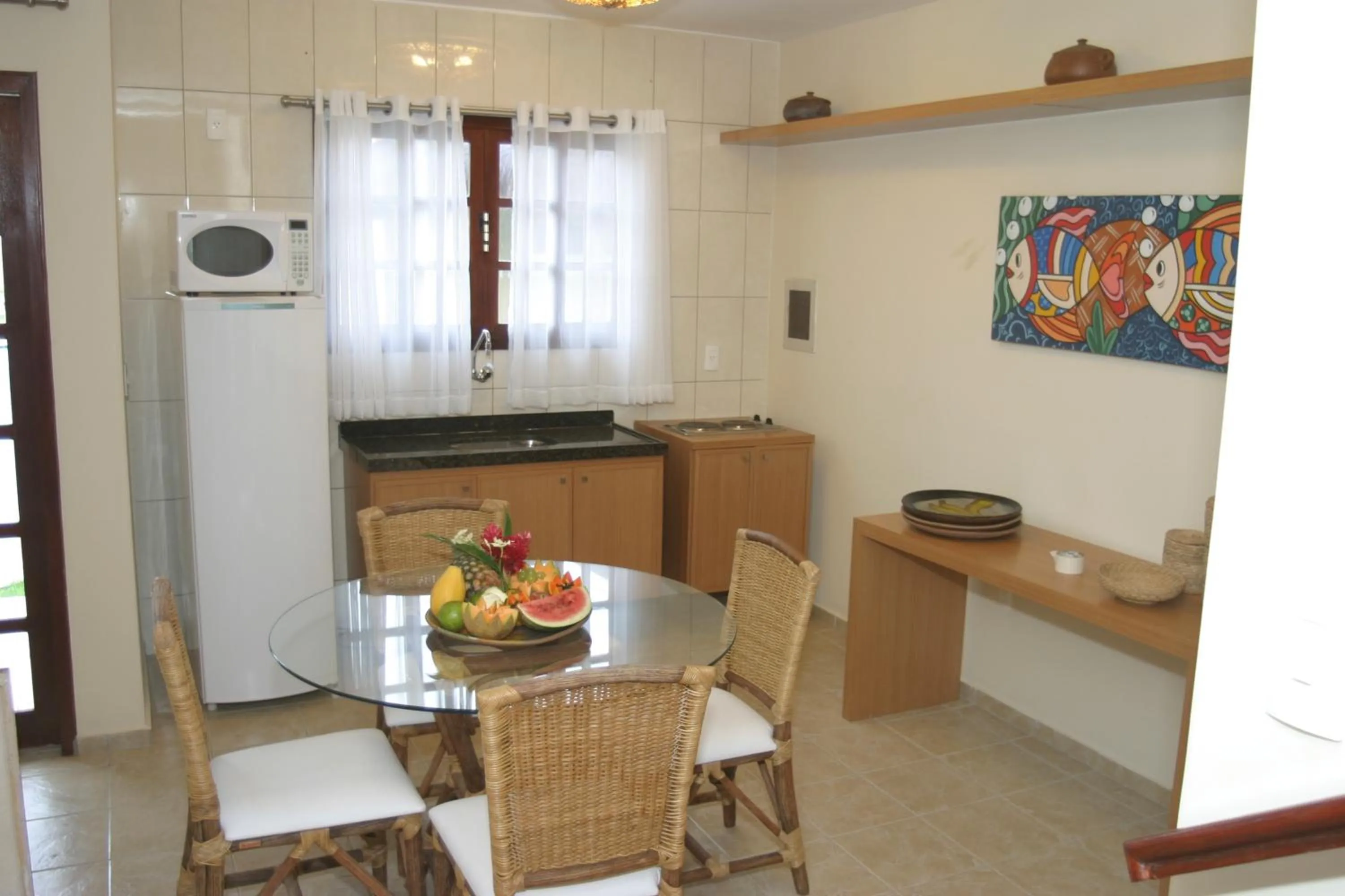Kitchen or kitchenette in CostaSol Pipa Chalés