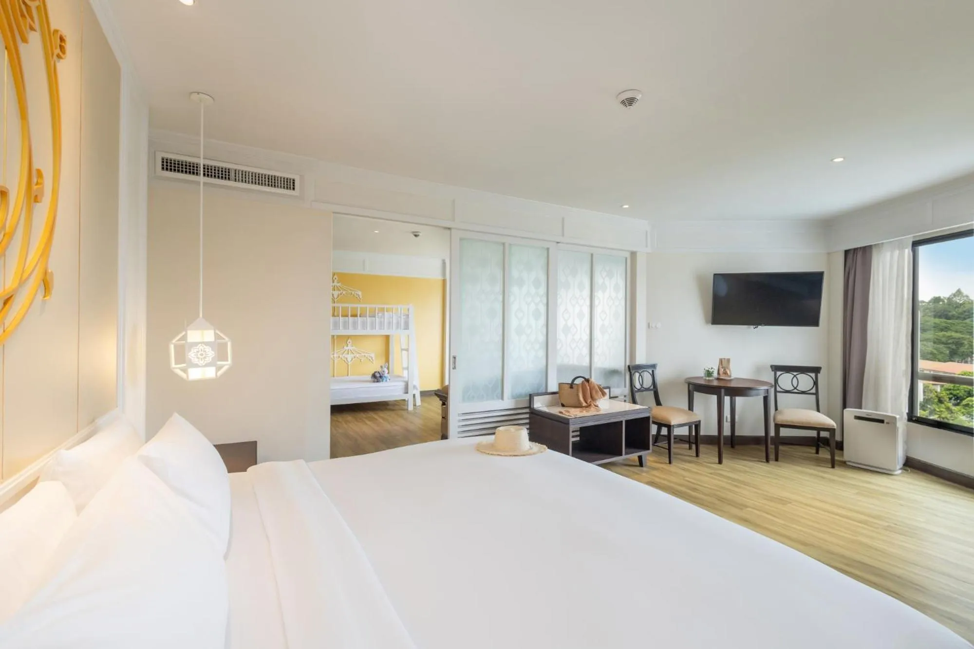 Bed in The Riverie by Katathani