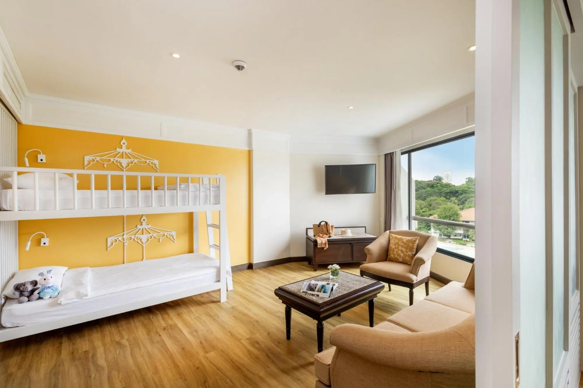 Seating area, Bed in The Riverie by Katathani