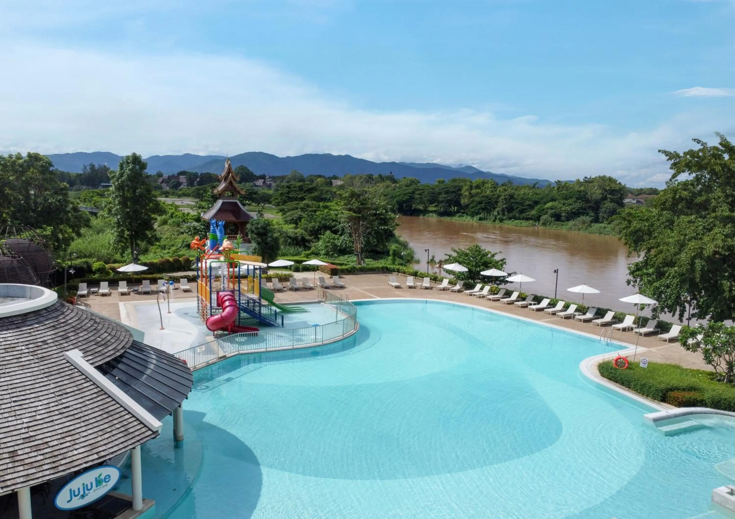 Swimming pool in The Riverie by Katathani