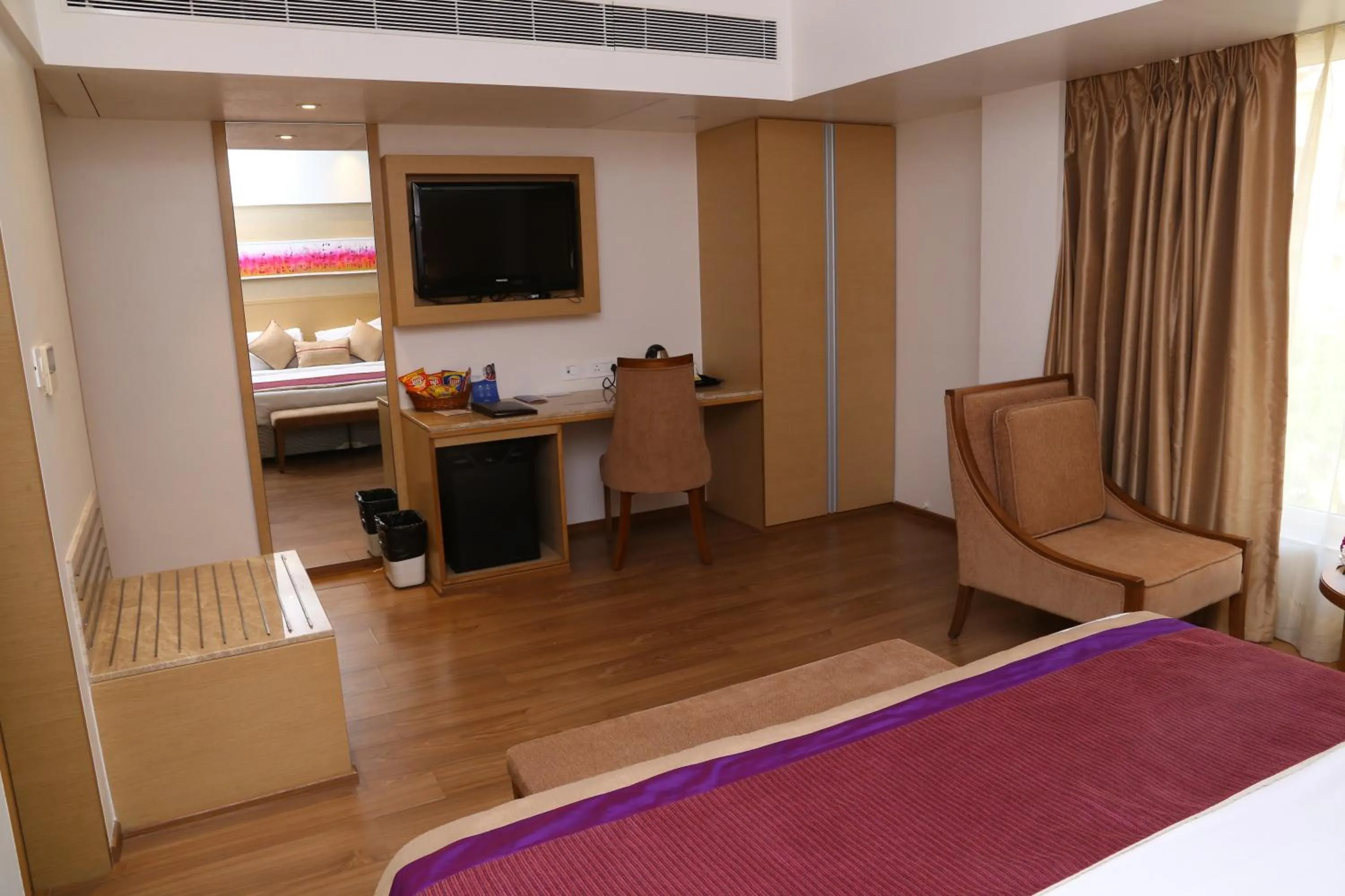 Bedroom, Bed in Sarovar Portico Rivera Ahmedabad