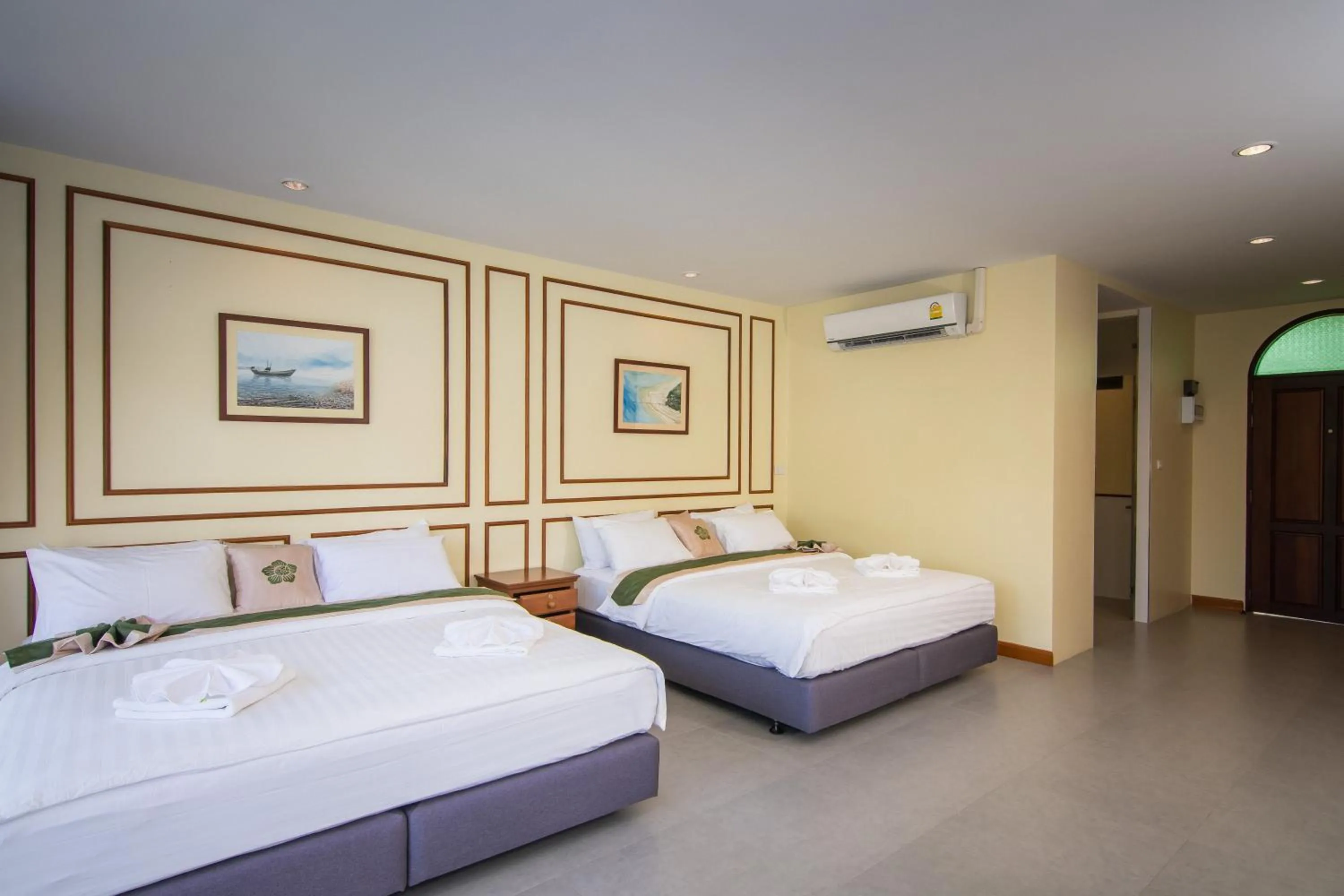 Bed in Baan Imm Sook Resort