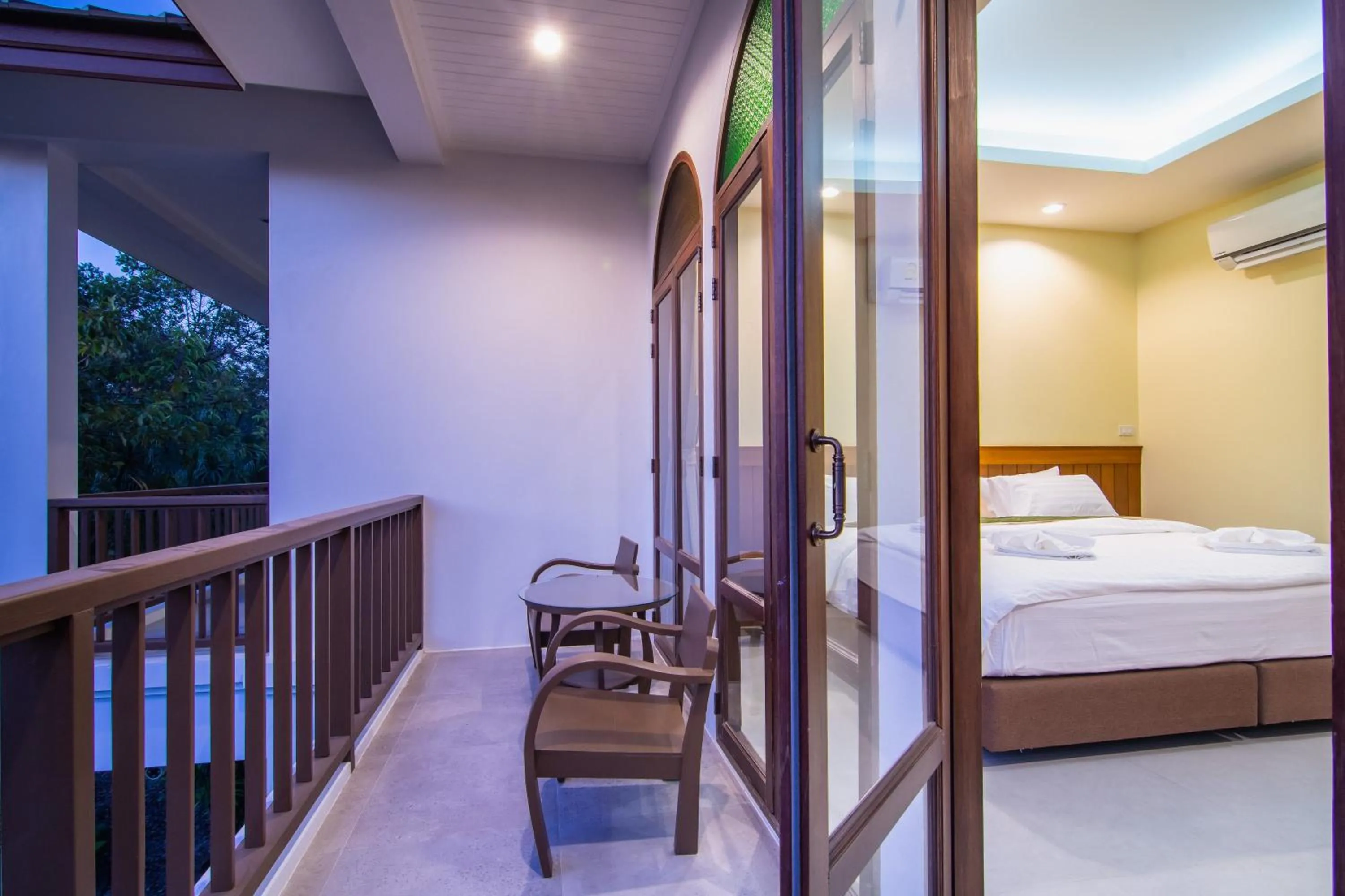 Bed in Baan Imm Sook Resort