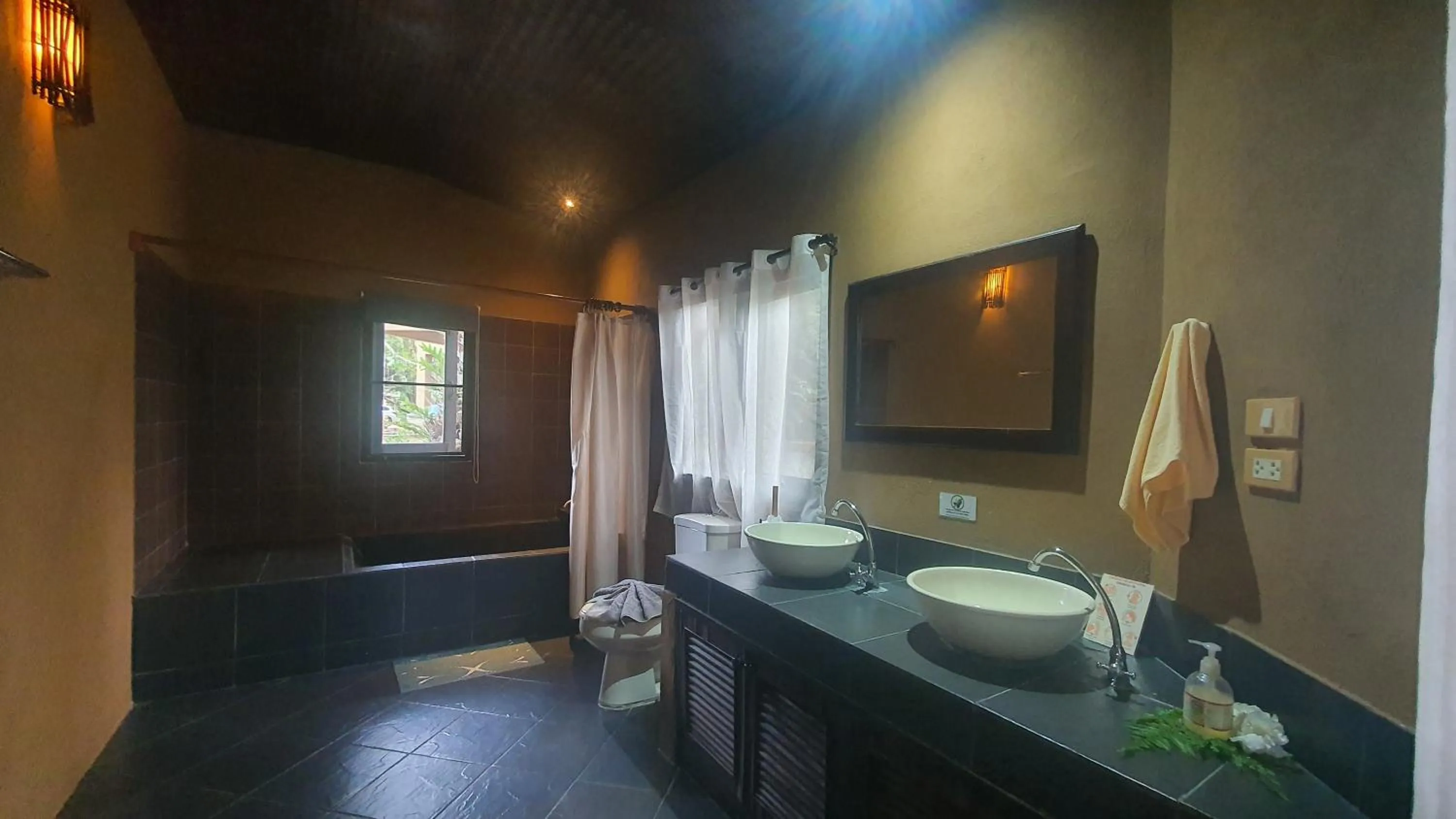 Bathroom in Melina Beach Front Bungalows
