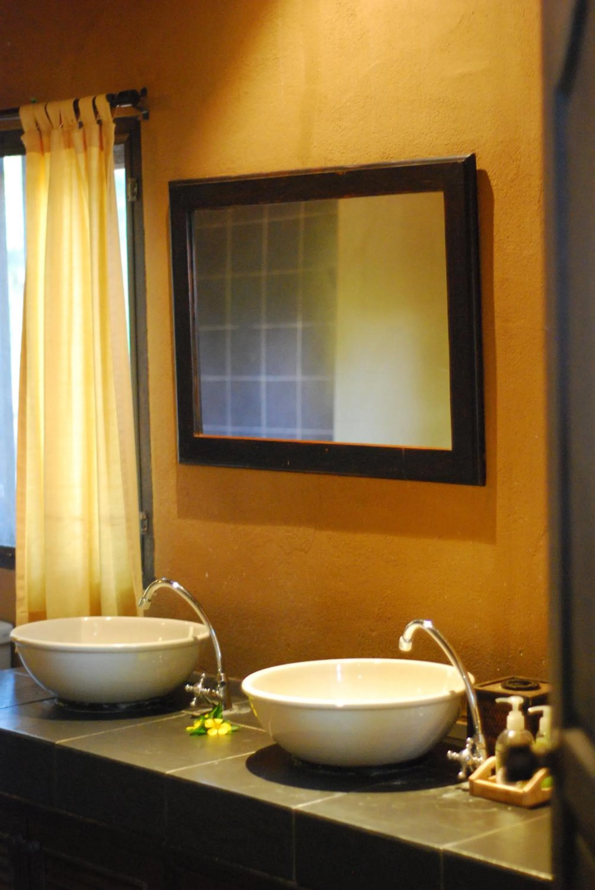 Bathroom in Melina Beach Front Bungalows