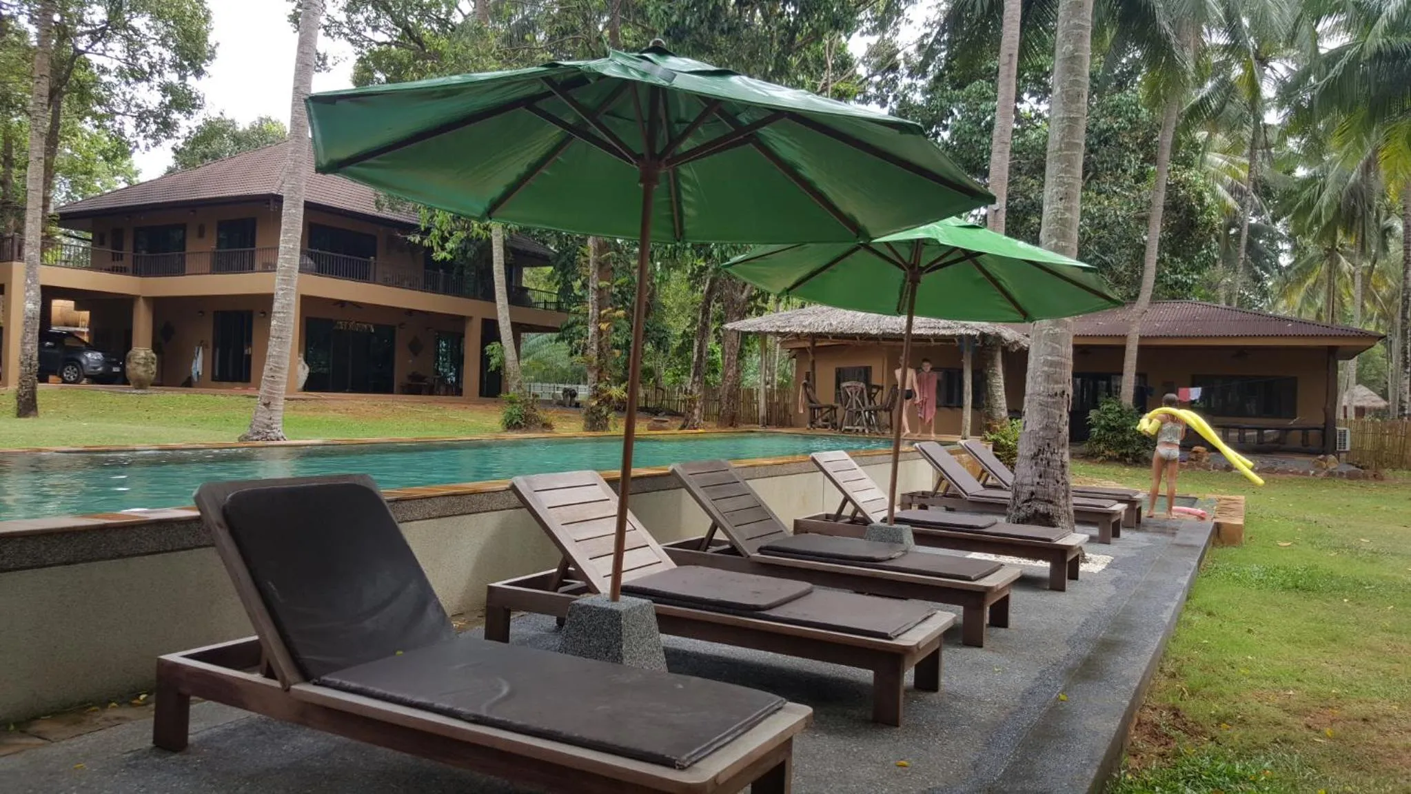 Swimming pool in Melina Beach Front Bungalows