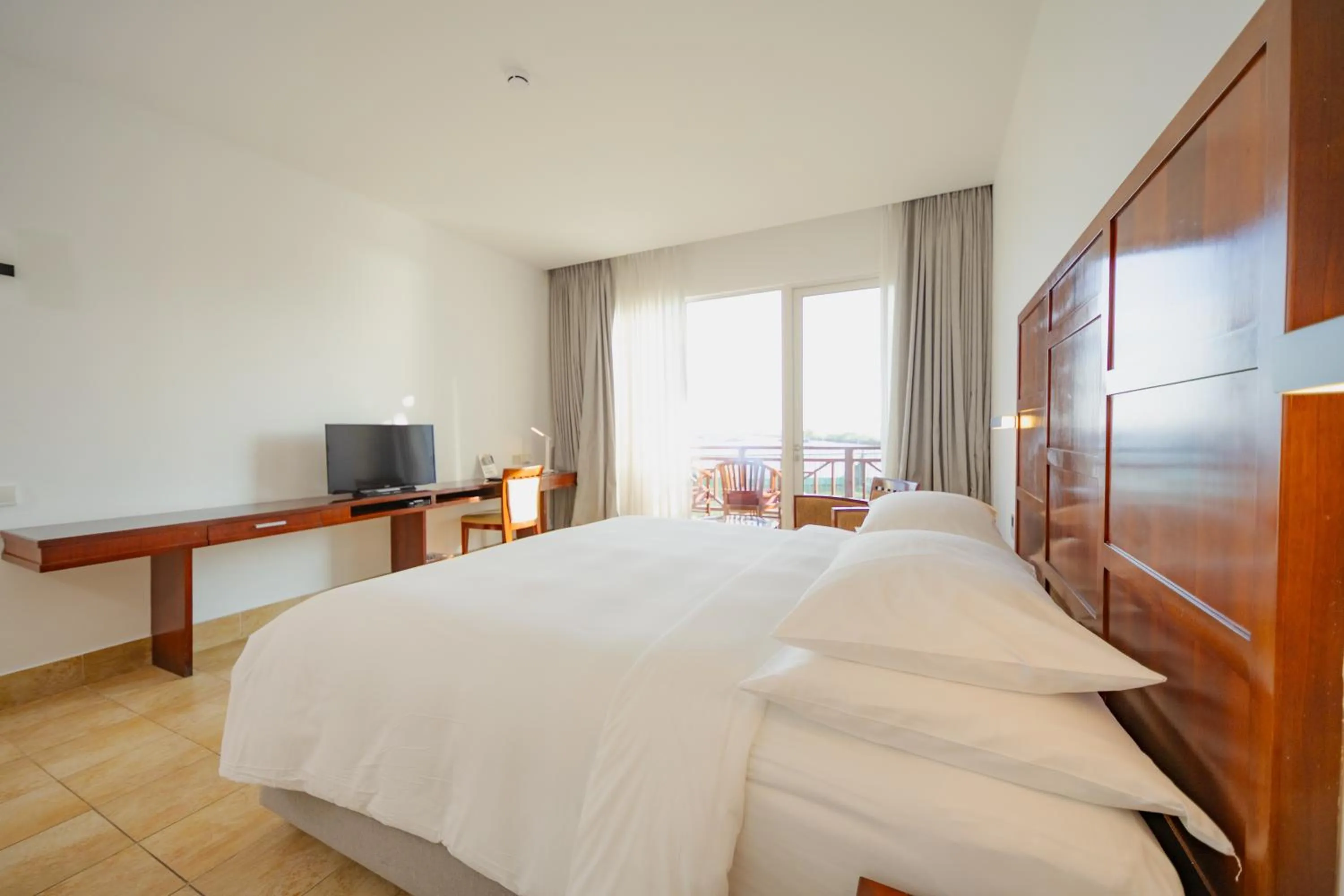 Photo of the whole room, Bed in Hulhule Island Hotel- Private Beach Access & Airport Pick-up and Drop