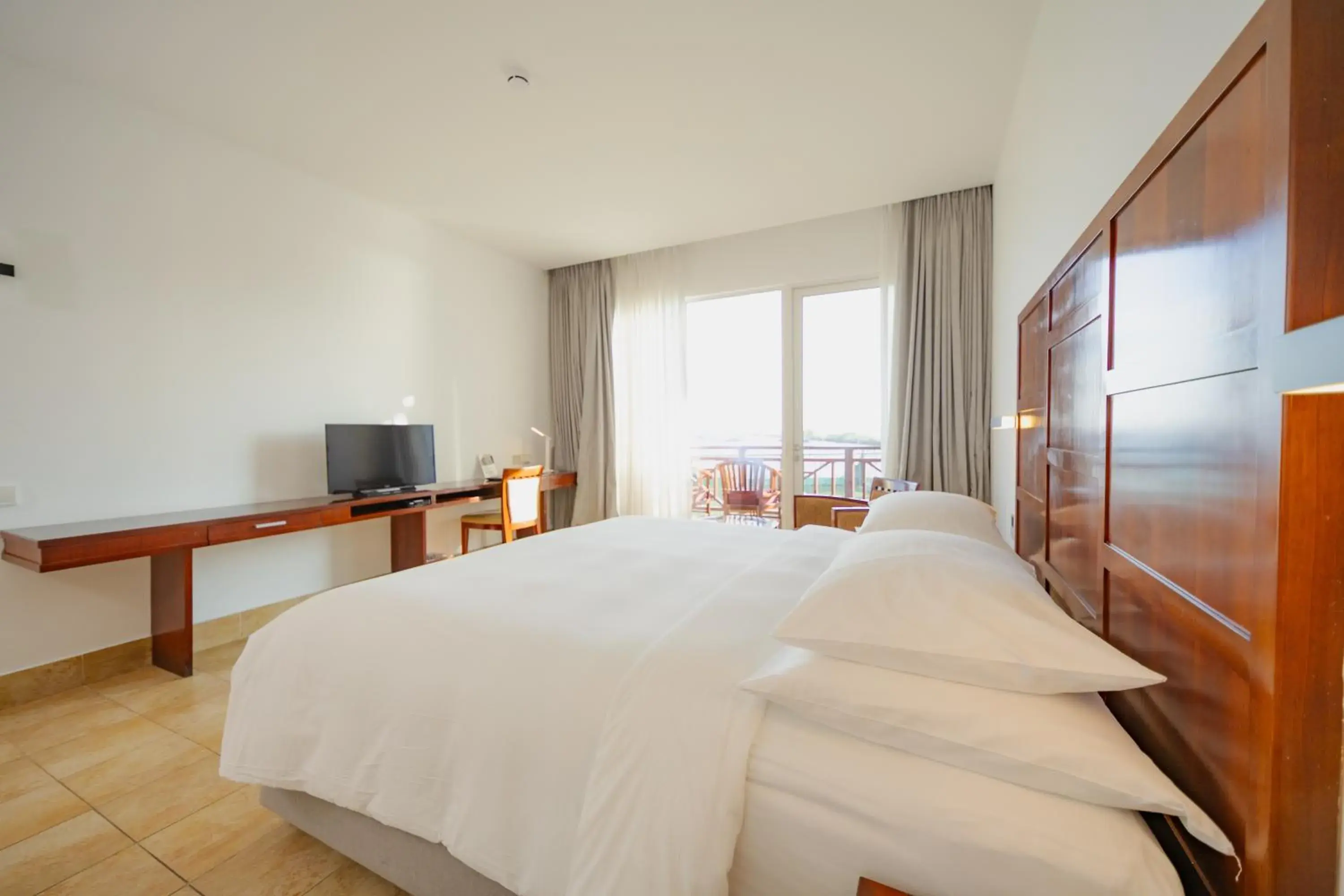 Deluxe Garden View in Hulhule Island Hotel- Private Beach Access & Airport Pick-up and Drop Deluxe Garden View in Hulhule Island Hotel- Private Beach Access & Airport Pick-up and Drop