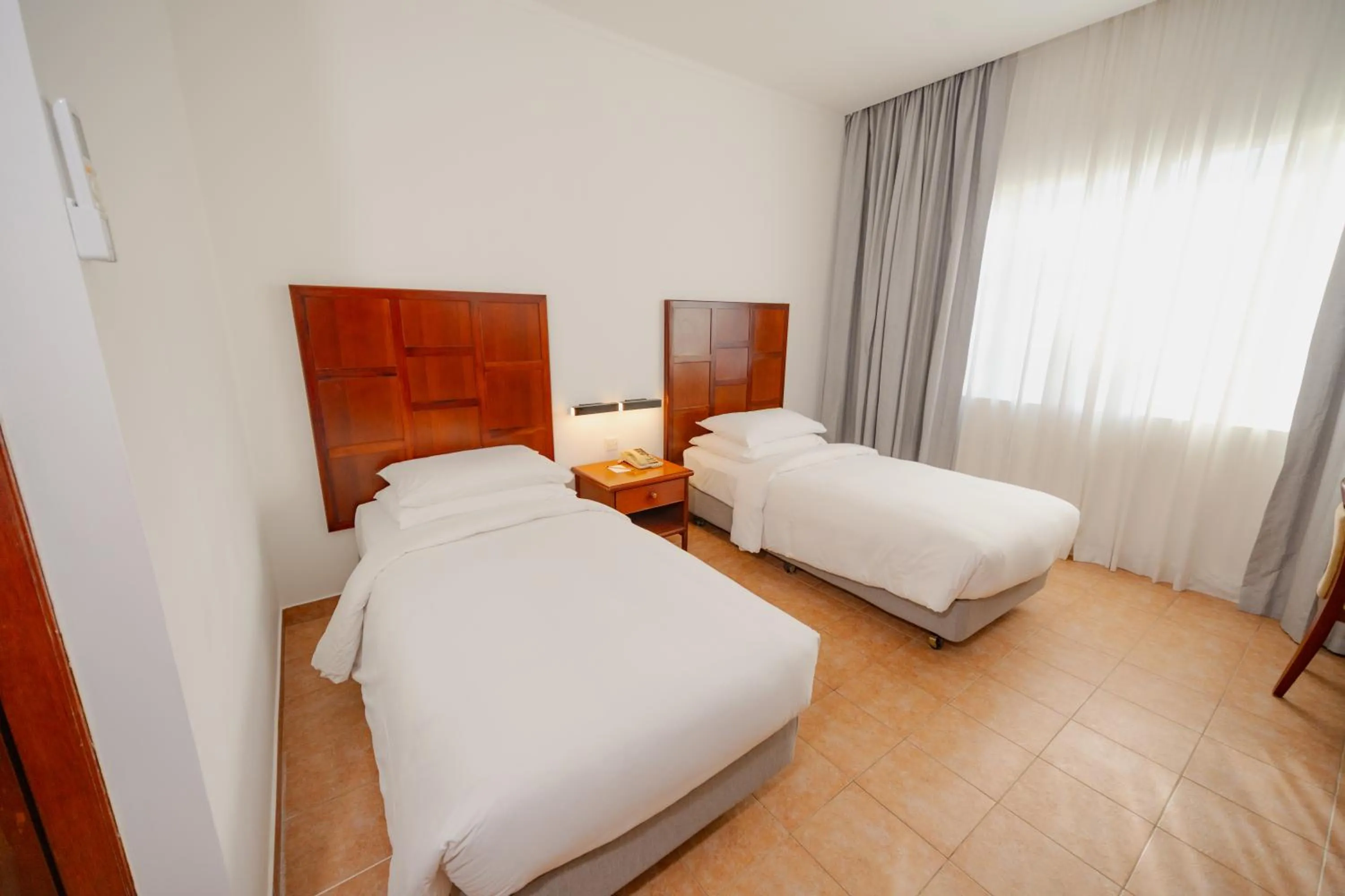 Bed in Hulhule Island Hotel- Private Beach Access & Airport Pick-up and Drop