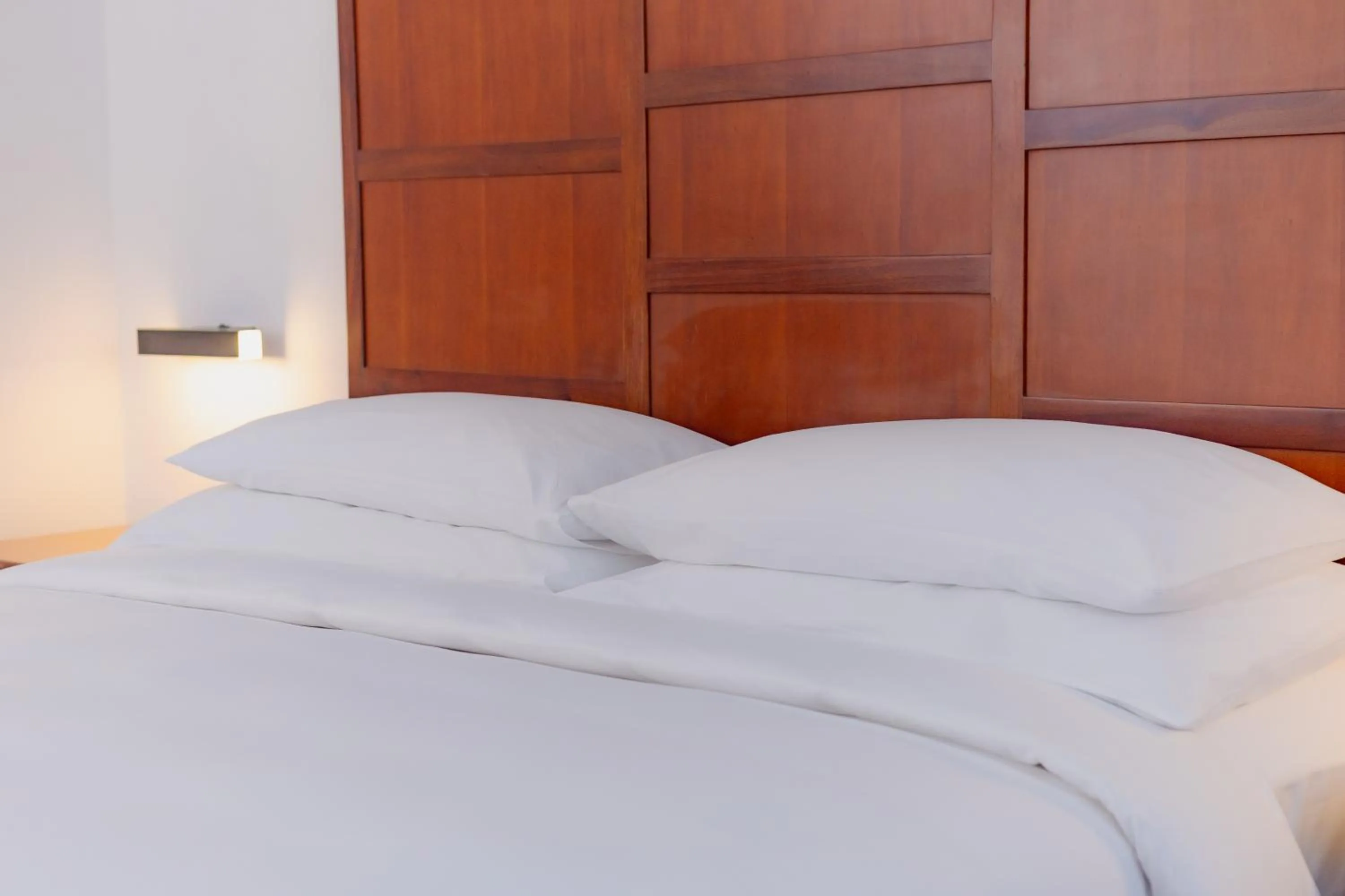 Bed in Hulhule Island Hotel- Private Beach Access & Airport Pick-up and Drop