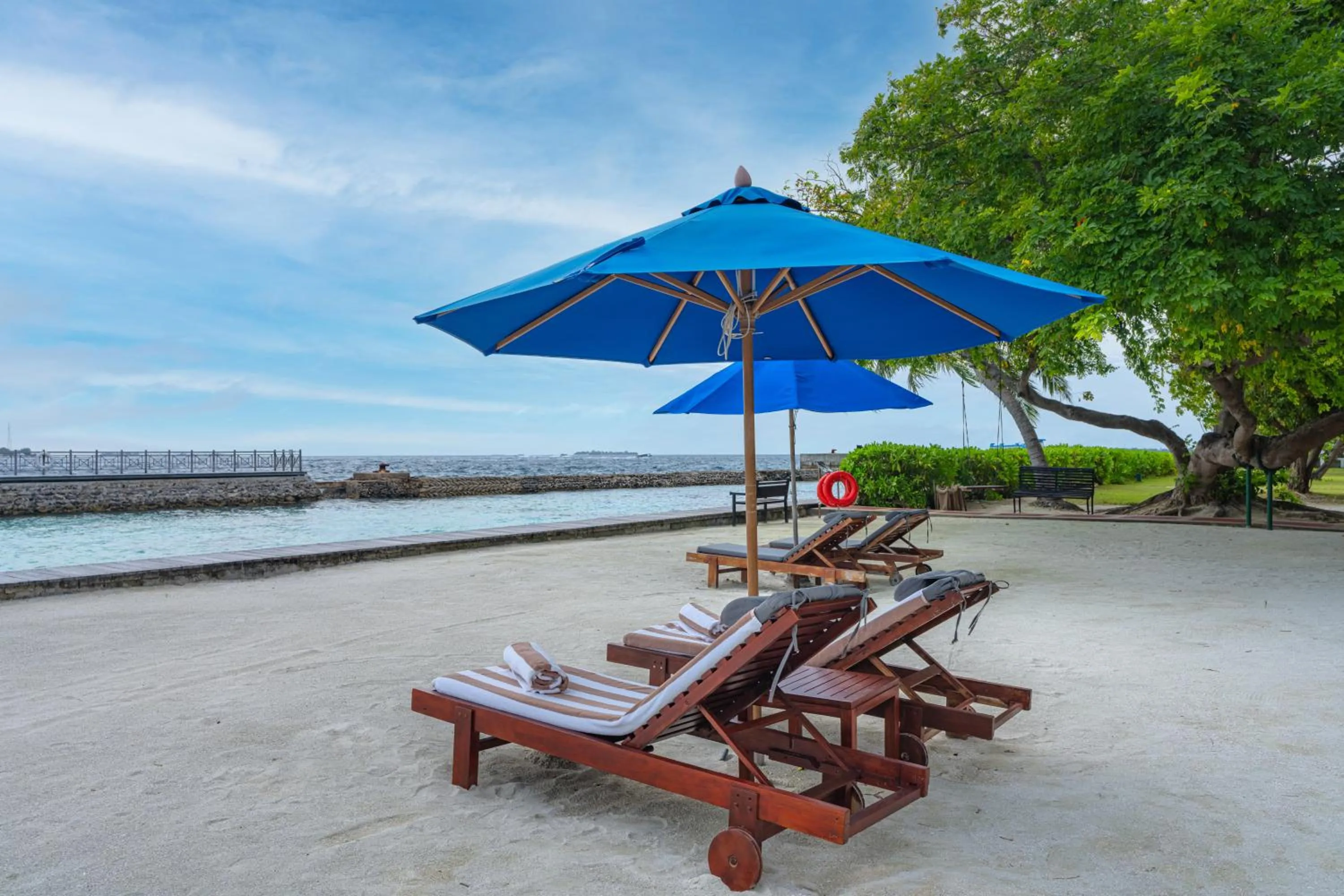 Day in Hulhule Island Hotel- Private Beach Access & Airport Pick-up and Drop