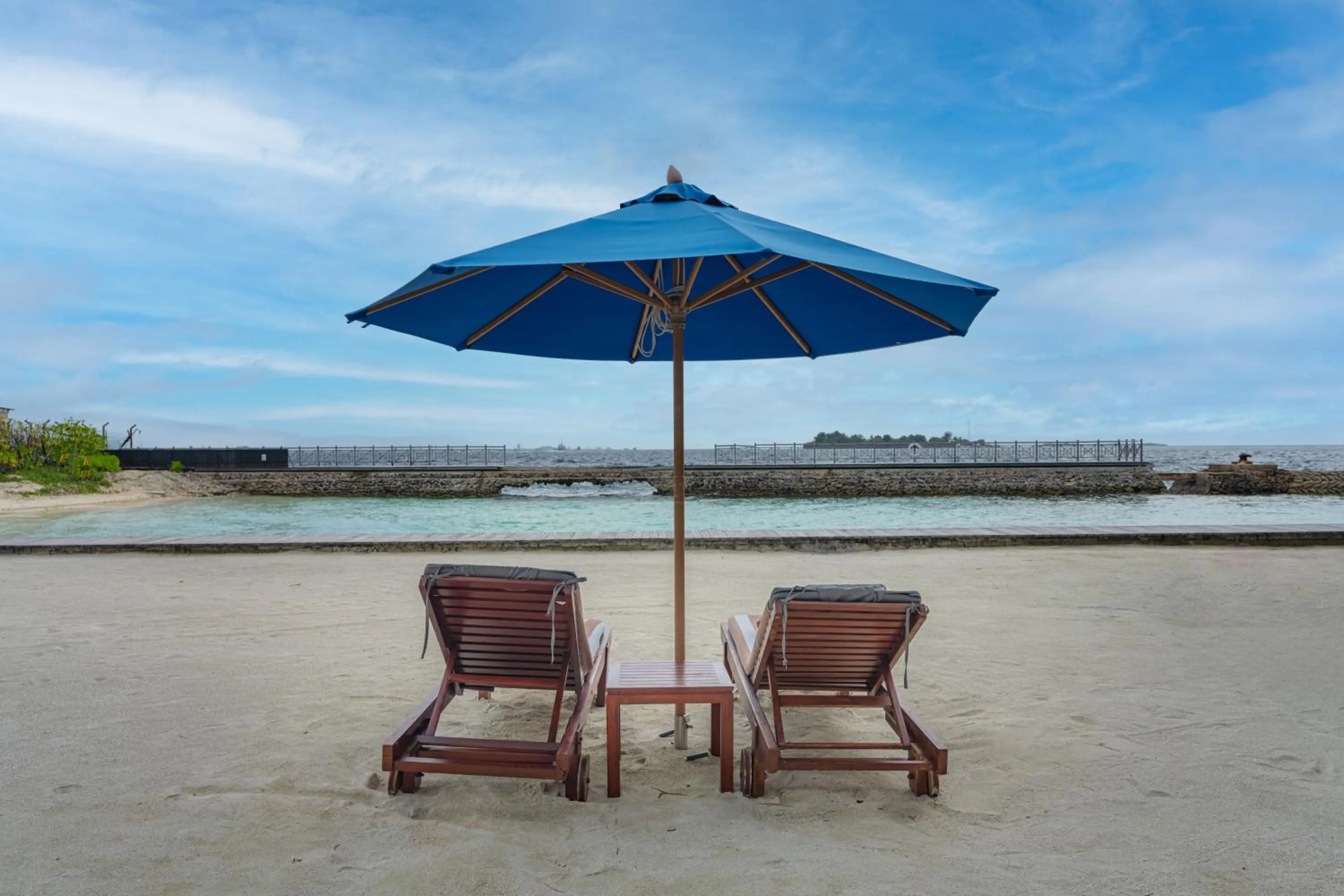 Property building in Hulhule Island Hotel- Private Beach Access & Airport Pick-up and Drop