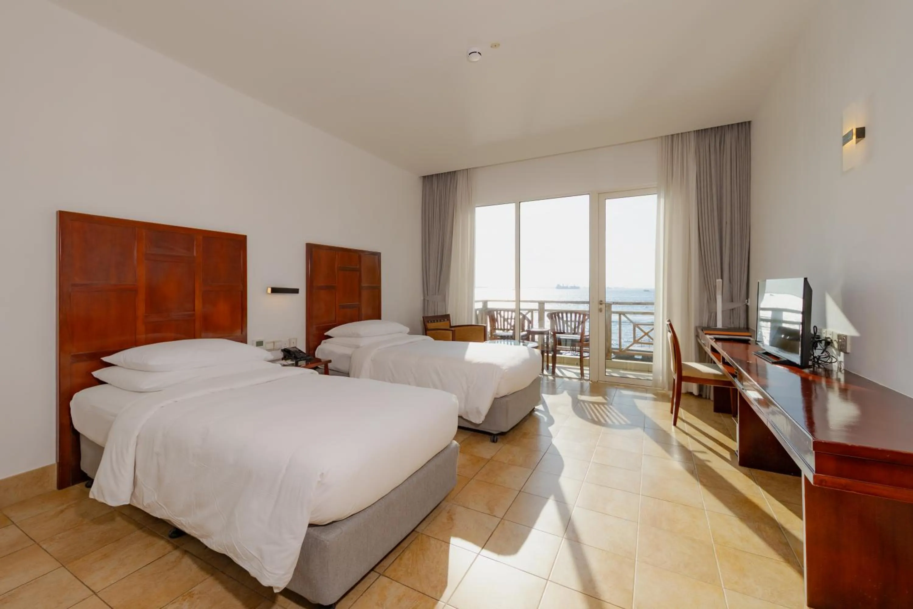 Bed in Hulhule Island Hotel- Private Beach Access & Airport Pick-up and Drop